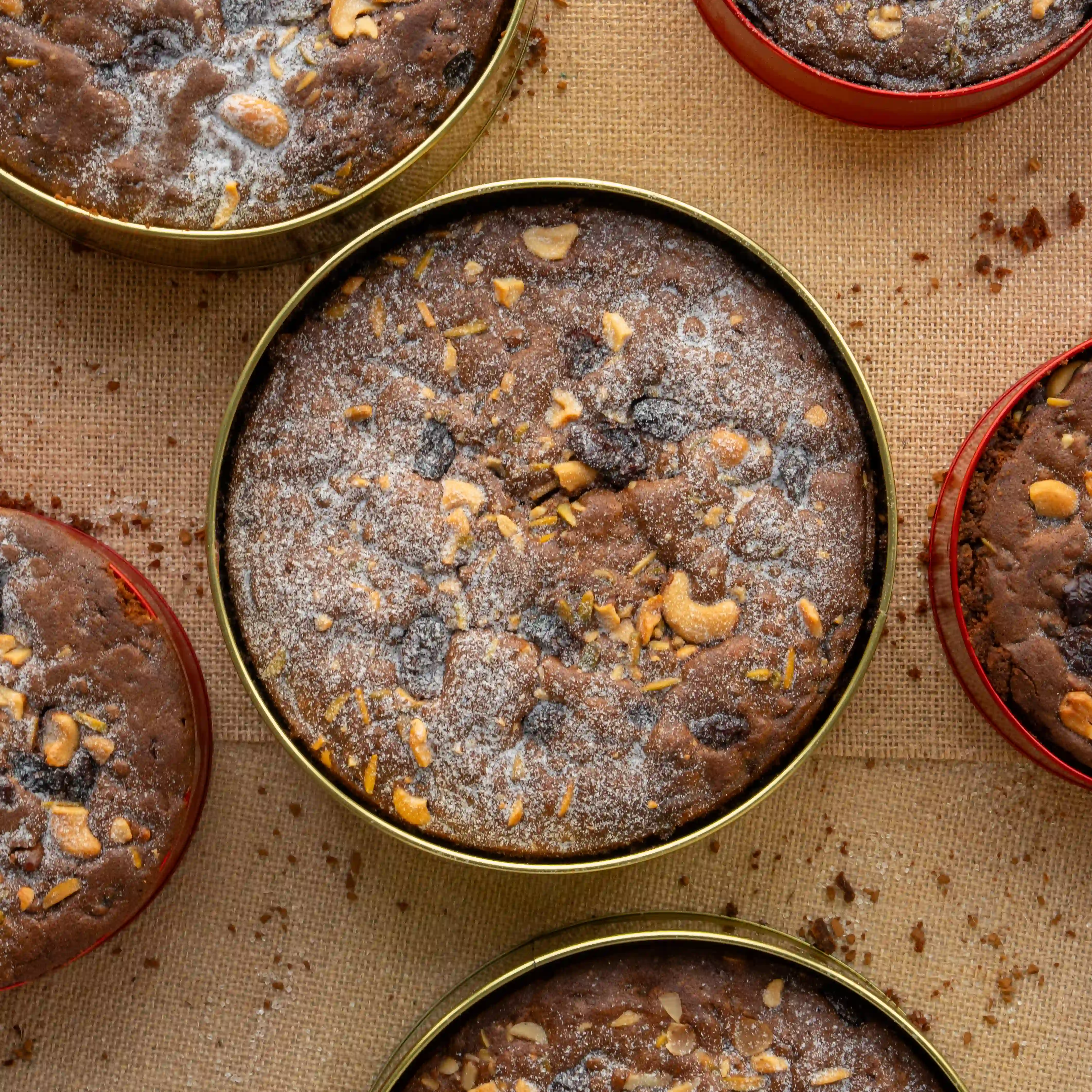 1 kg traditional plum cake topped with dried fruits and nuts