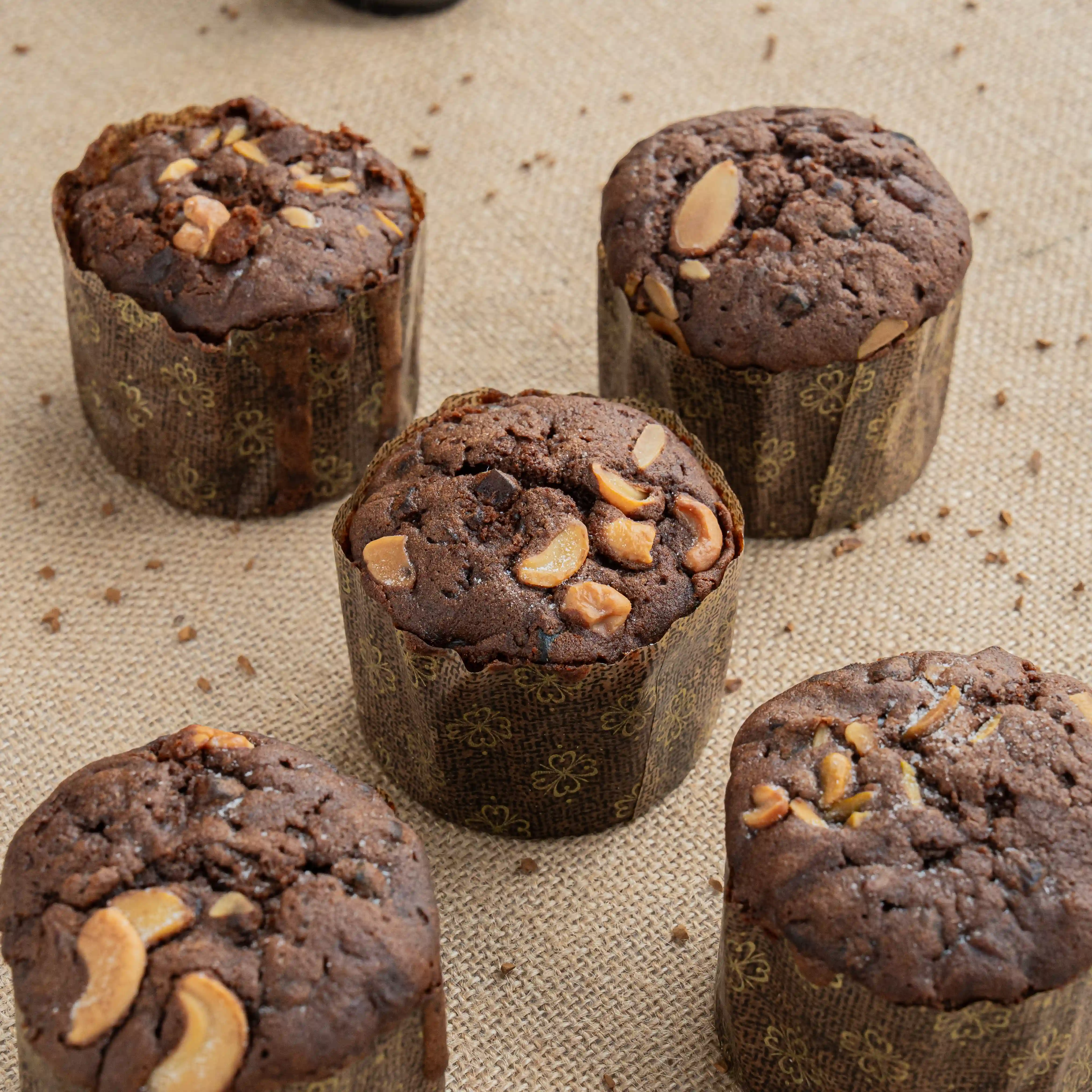 6 pcs mini plum cupcakes topped with nuts on festive packaging