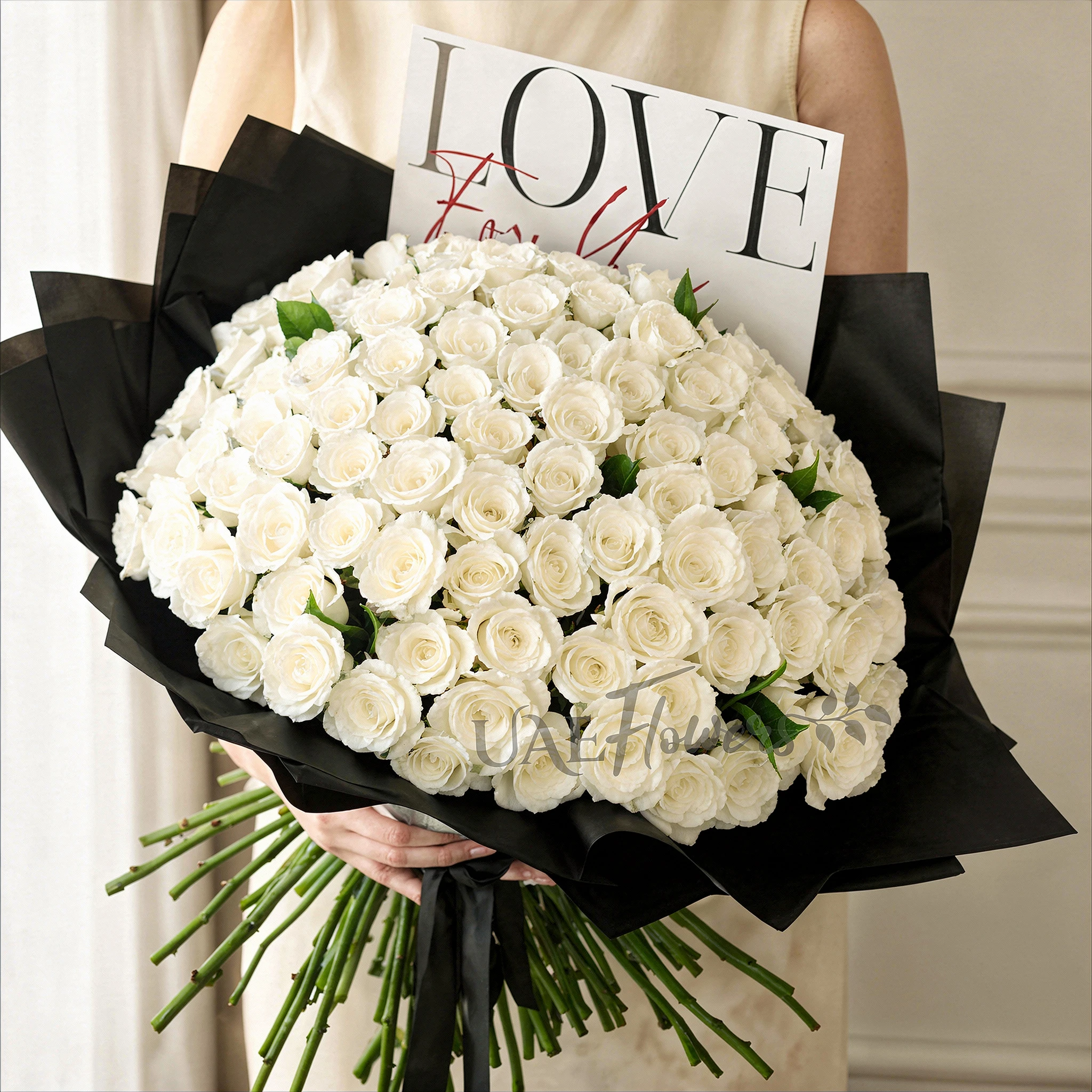 Bouquet of 150 white roses in black wrapping and 6 Pcs Pistache Petite Indulgence Chocolate Box.