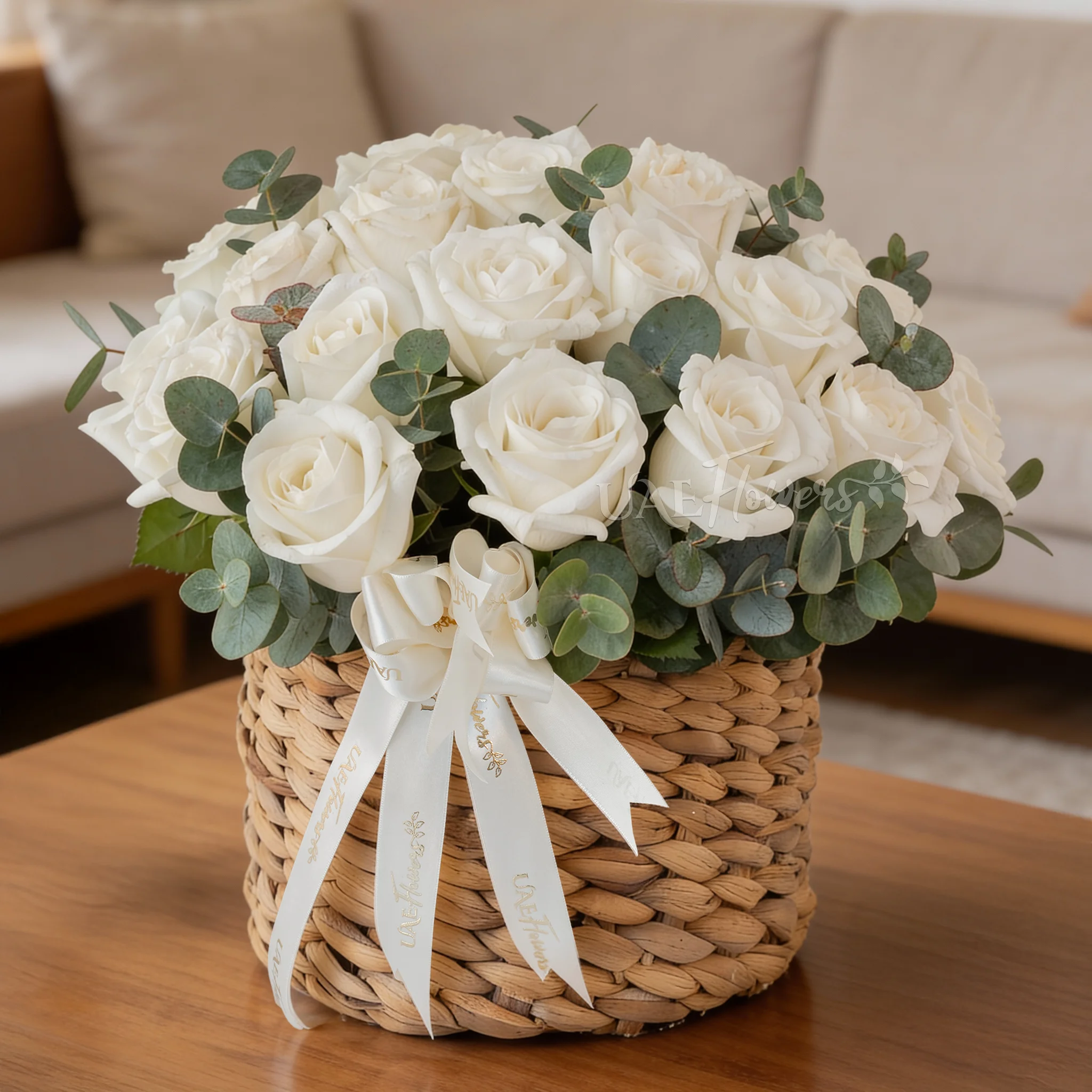 12 White Roses in a Round Basket