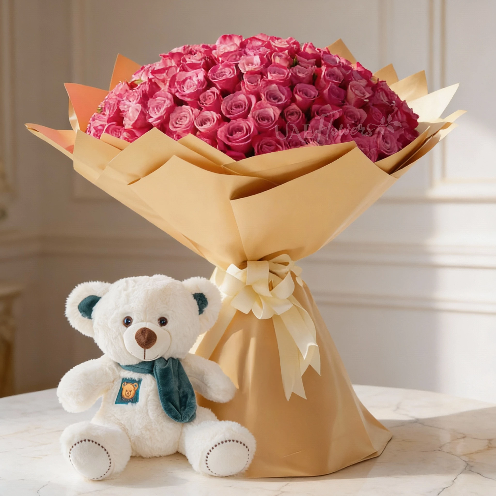 Bouquet of 100 purple roses with green fillers in nice wrapping and small white teddy bear.