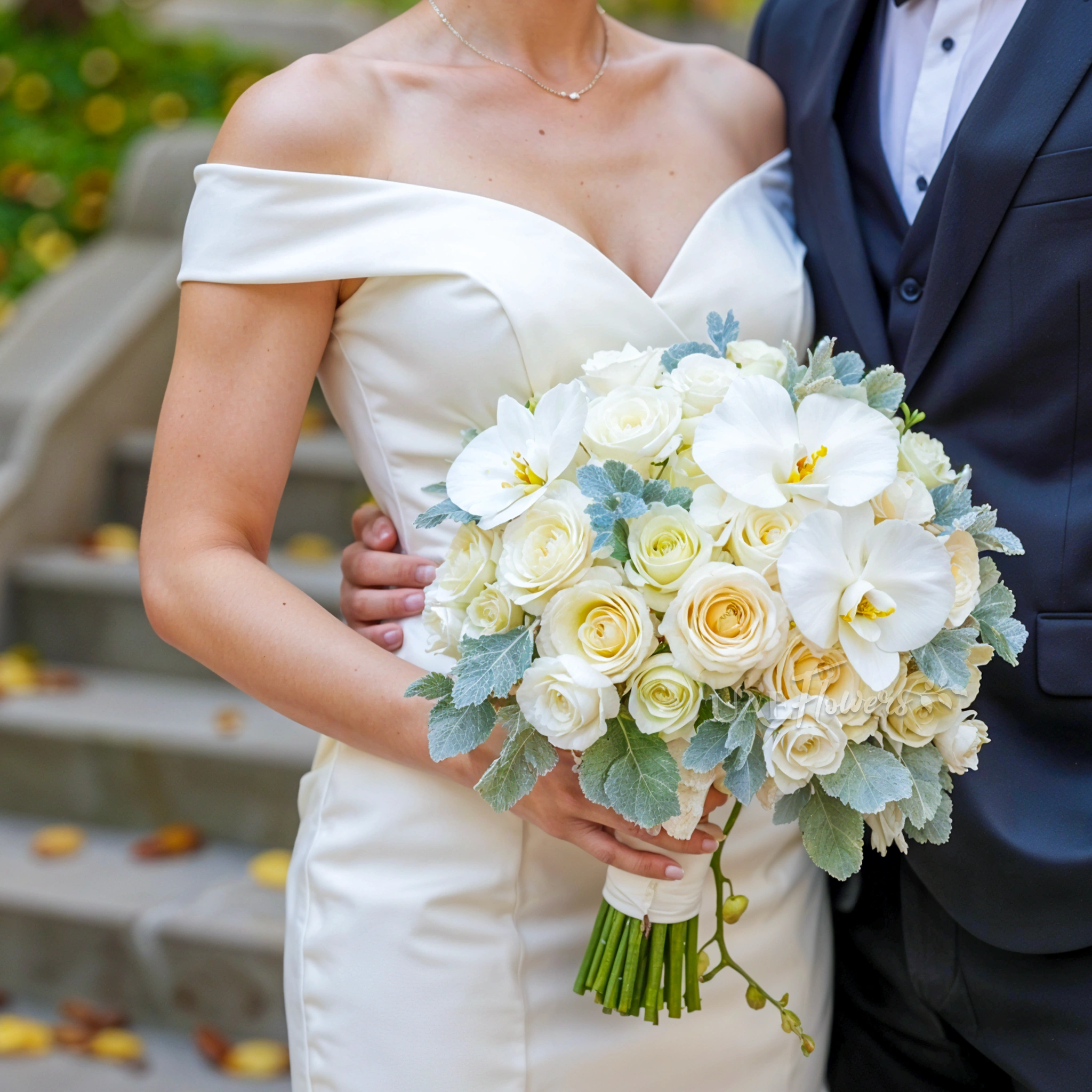 Bridal hand-tied bouquet of 1 white phalaenopsis, 10 white roses, 5 white lisianthus with greens