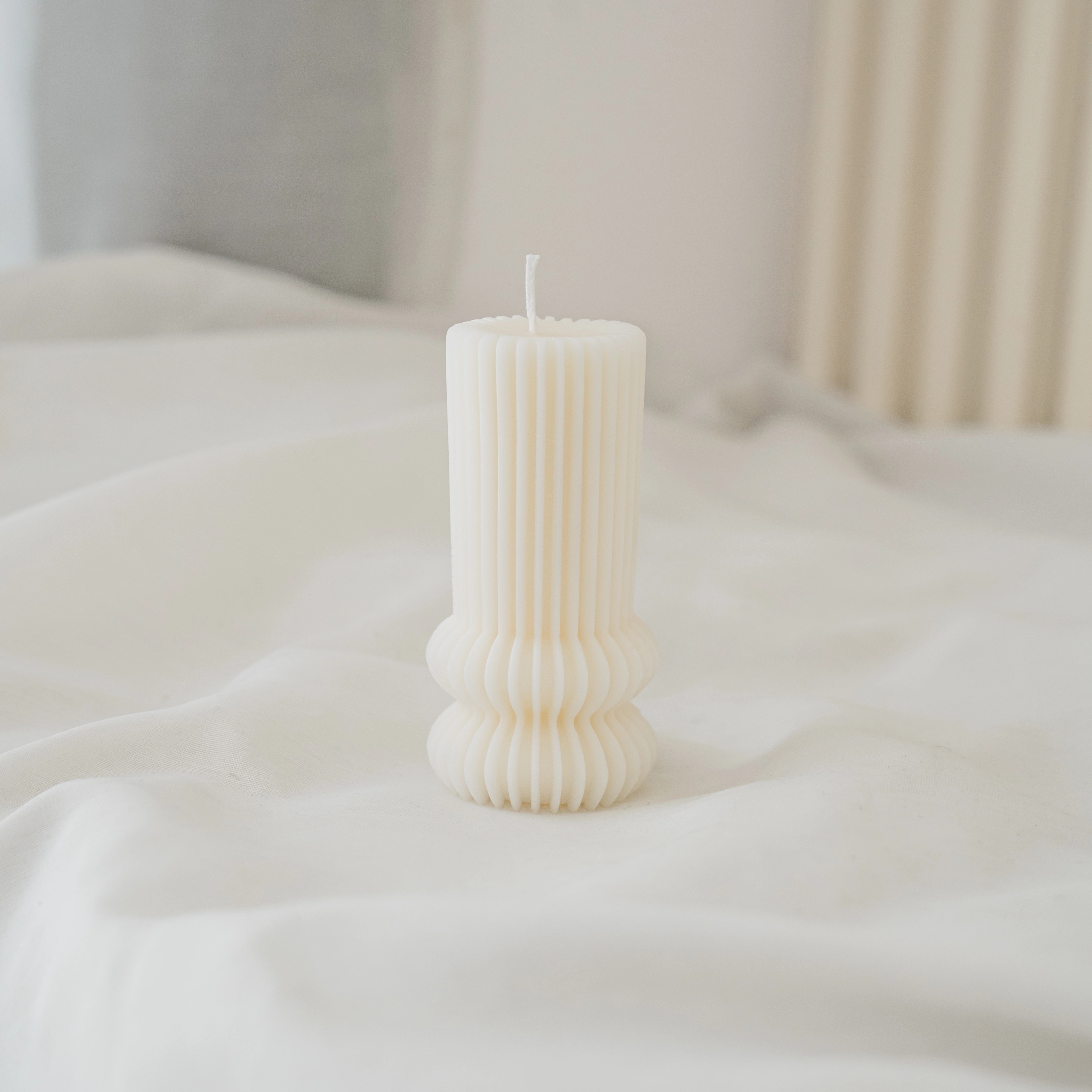Handcrafted Ivory Harmony Sculpted Pillar Candle with Modern Ribbed Design, Decorative Unscented Ivory Wax Candle for Minimalist Home Décor and Gifting