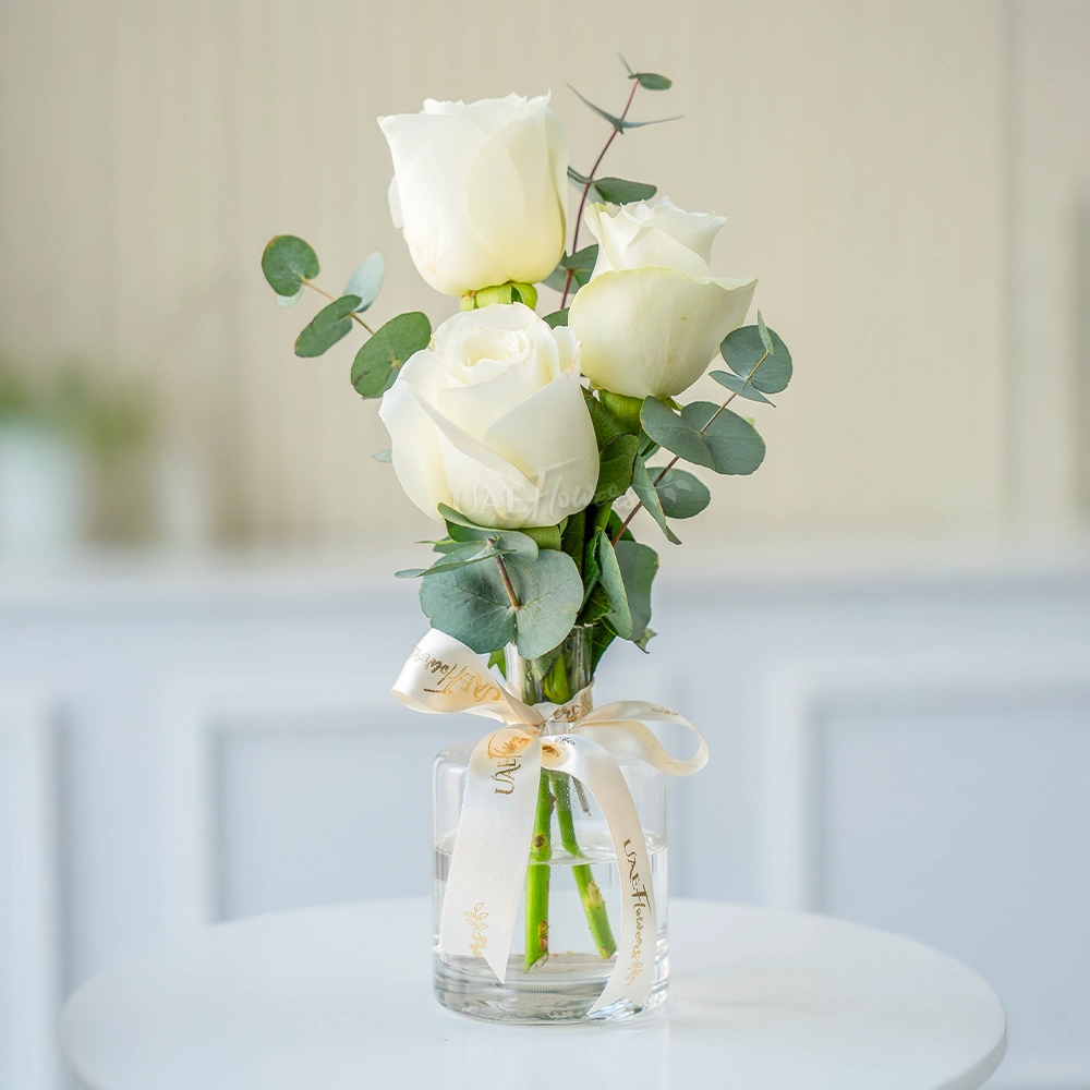 Pure Trio White Rose Vase with fresh white roses in a clear vase
