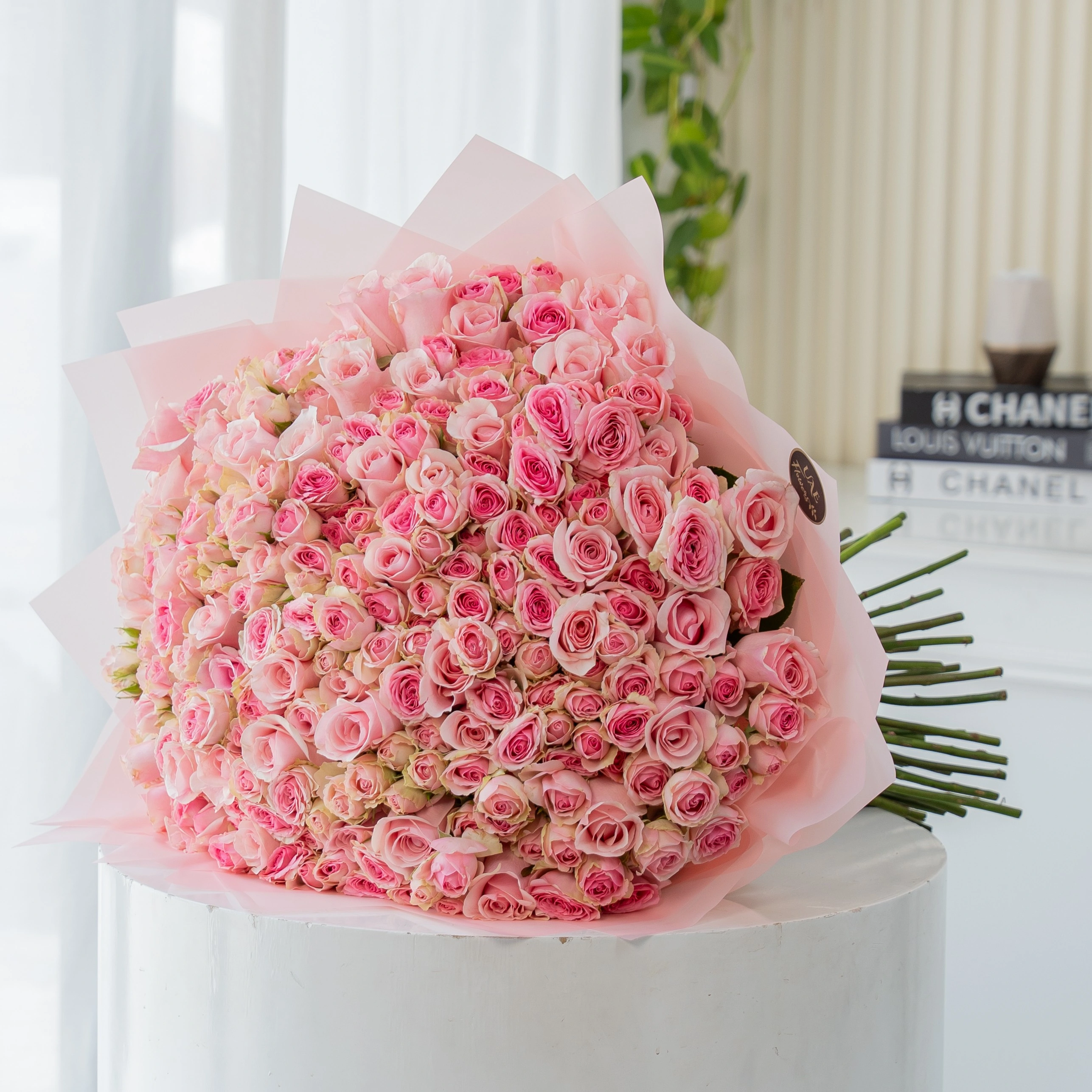 200 pink spray roses bouquet in blush wrapping