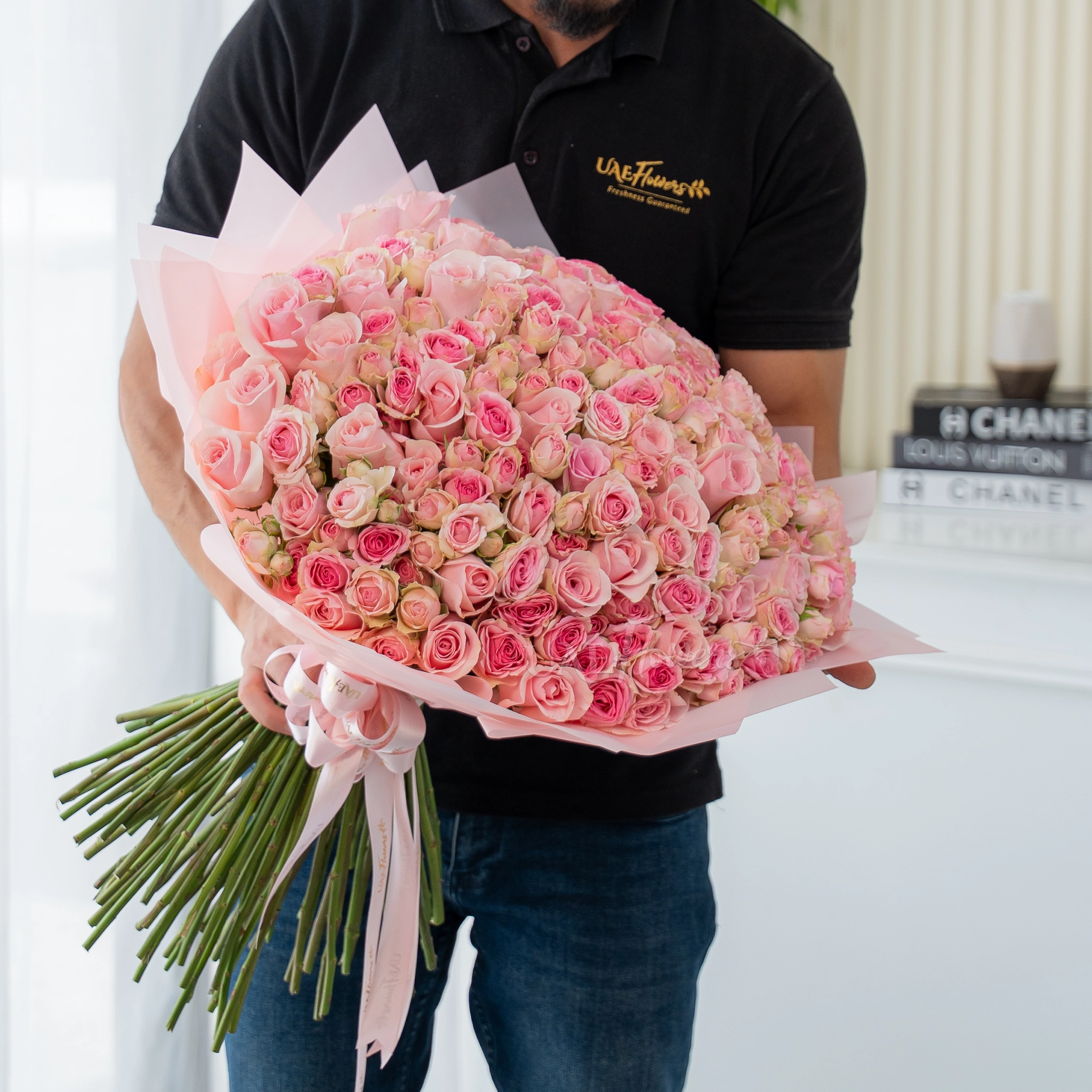 200 pink spray roses bouquet in blush wrapping