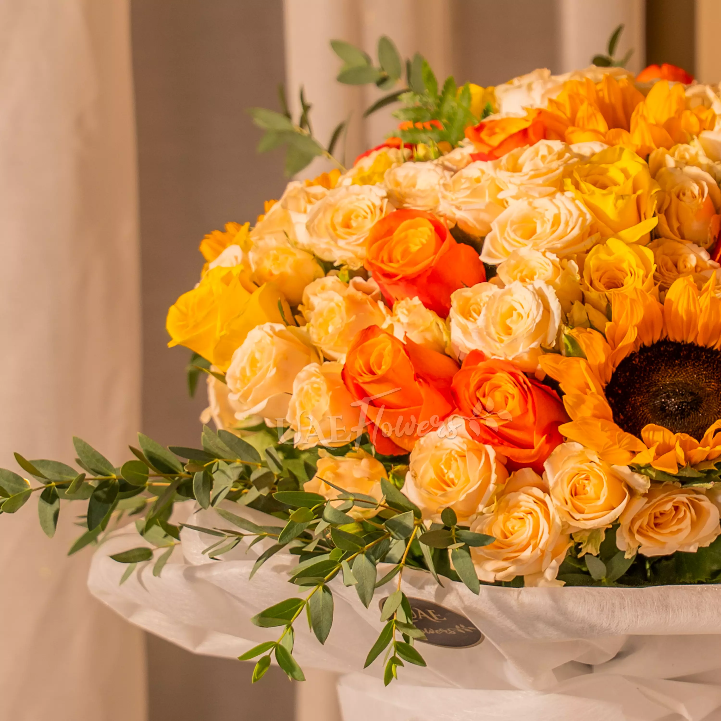 Sunflowers, yellow and orange roses bouquet for Diwali by UAE Flowers Dubai