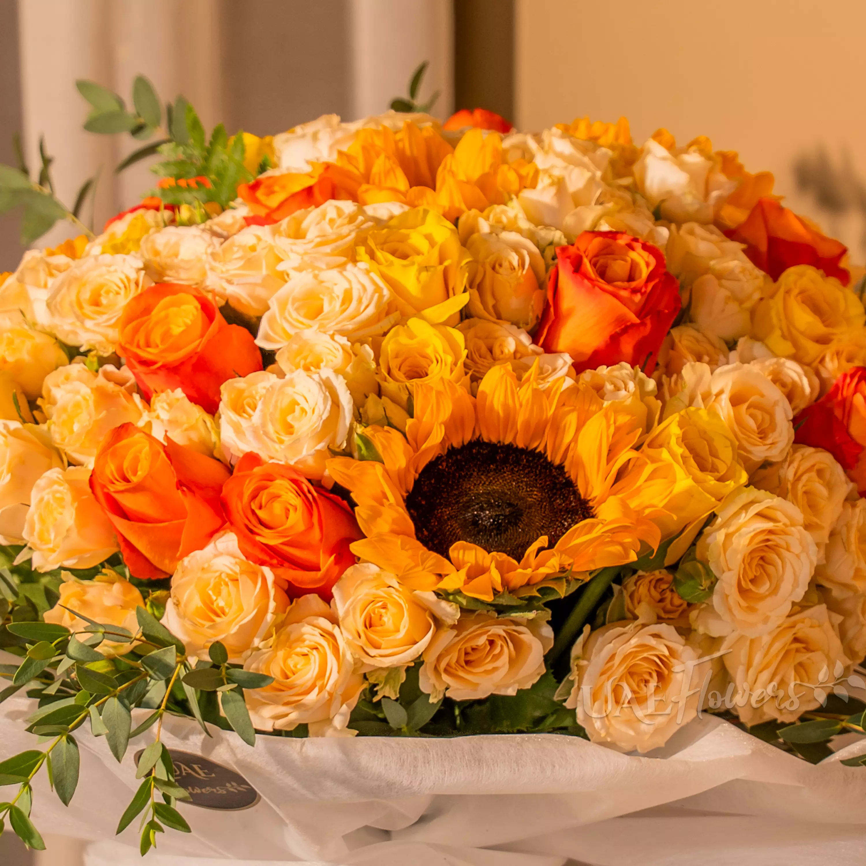 Sunflowers, yellow and orange roses bouquet for Diwali by UAE Flowers Dubai