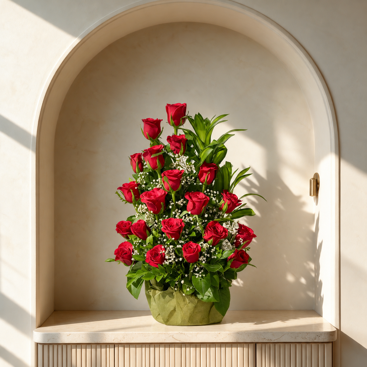 Tall red rose arrangement with white baby's breath and green foliage
