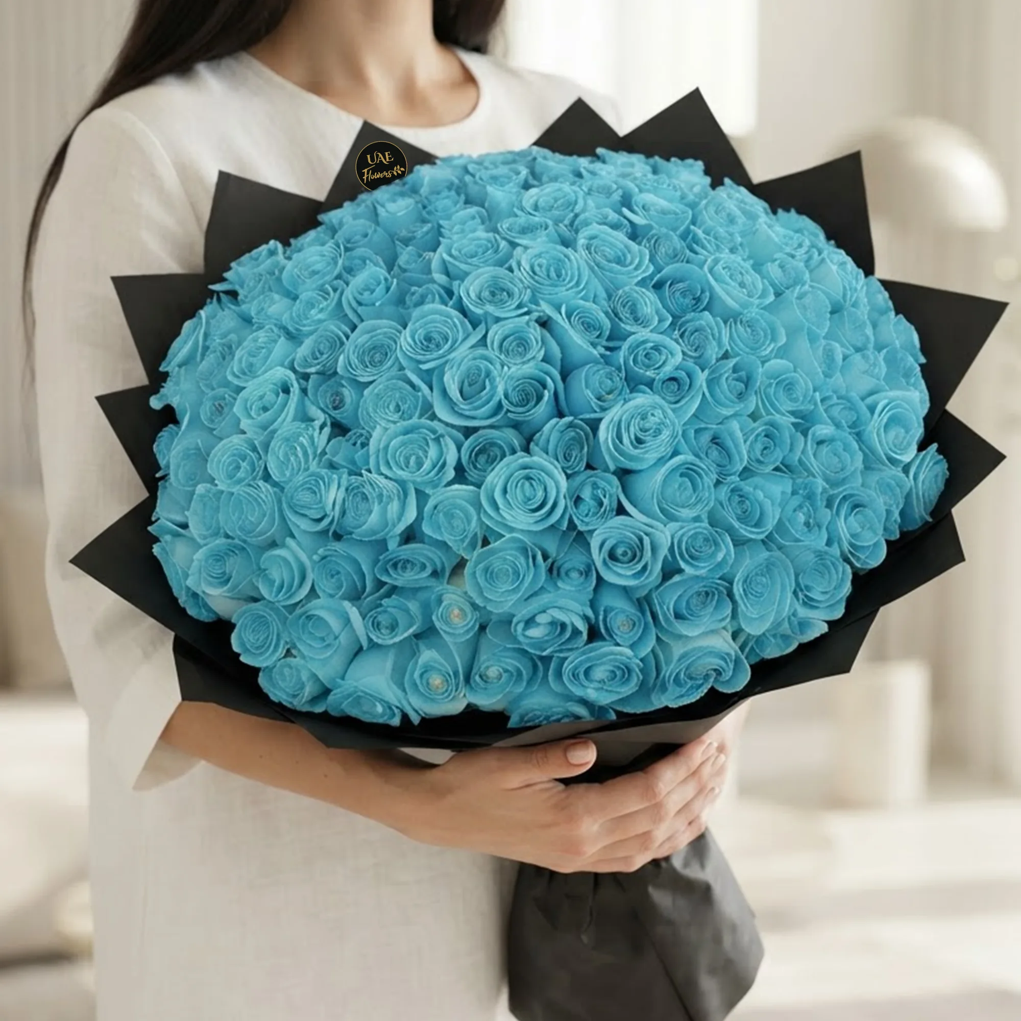 100 light blue roses bouquet in black wrapping