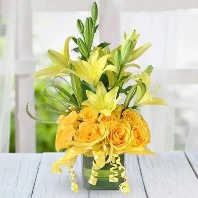 Arrangement of Yellow Roses & Lilies in a Vase