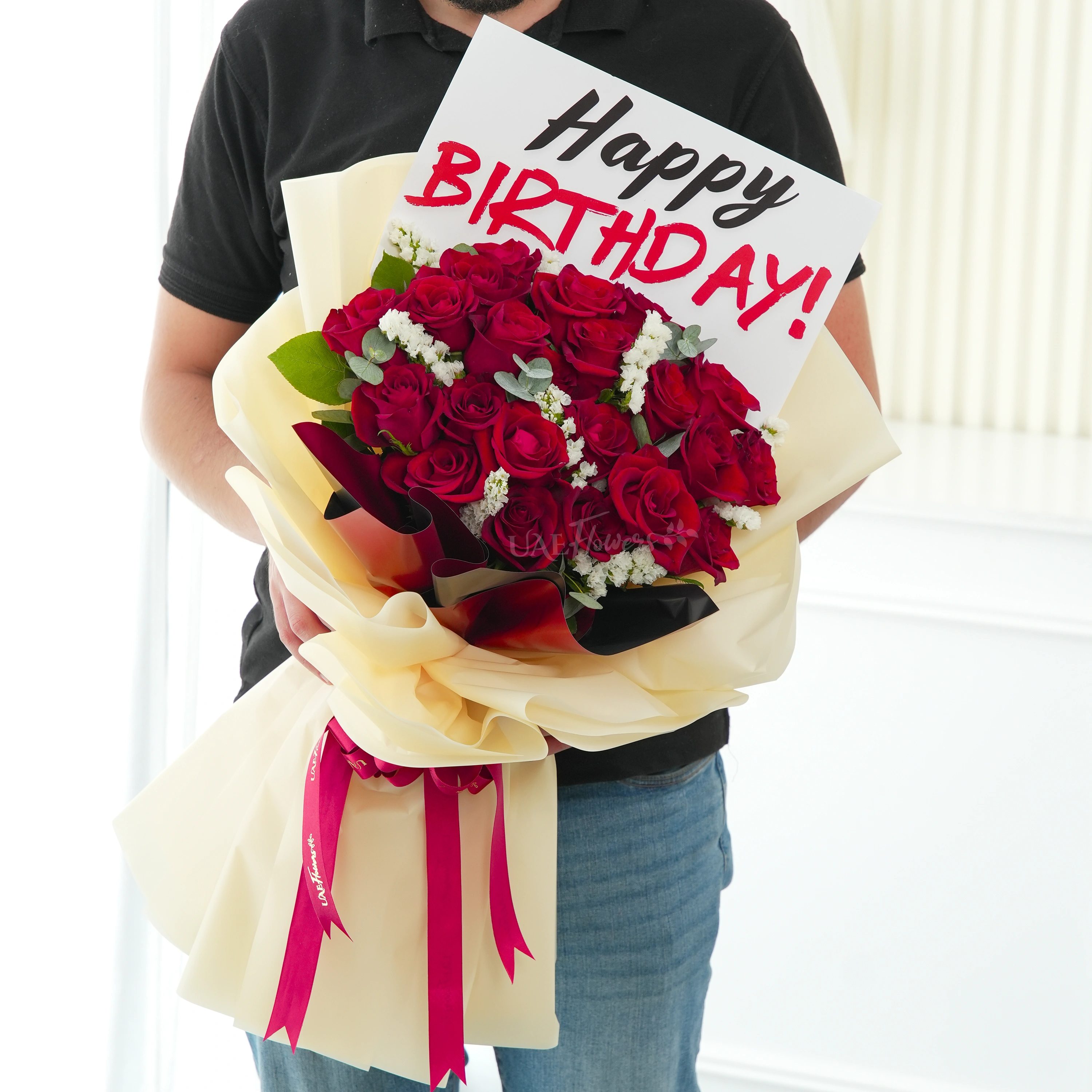 Bouquet of 20 red roses with green fillers in nice wrapping.