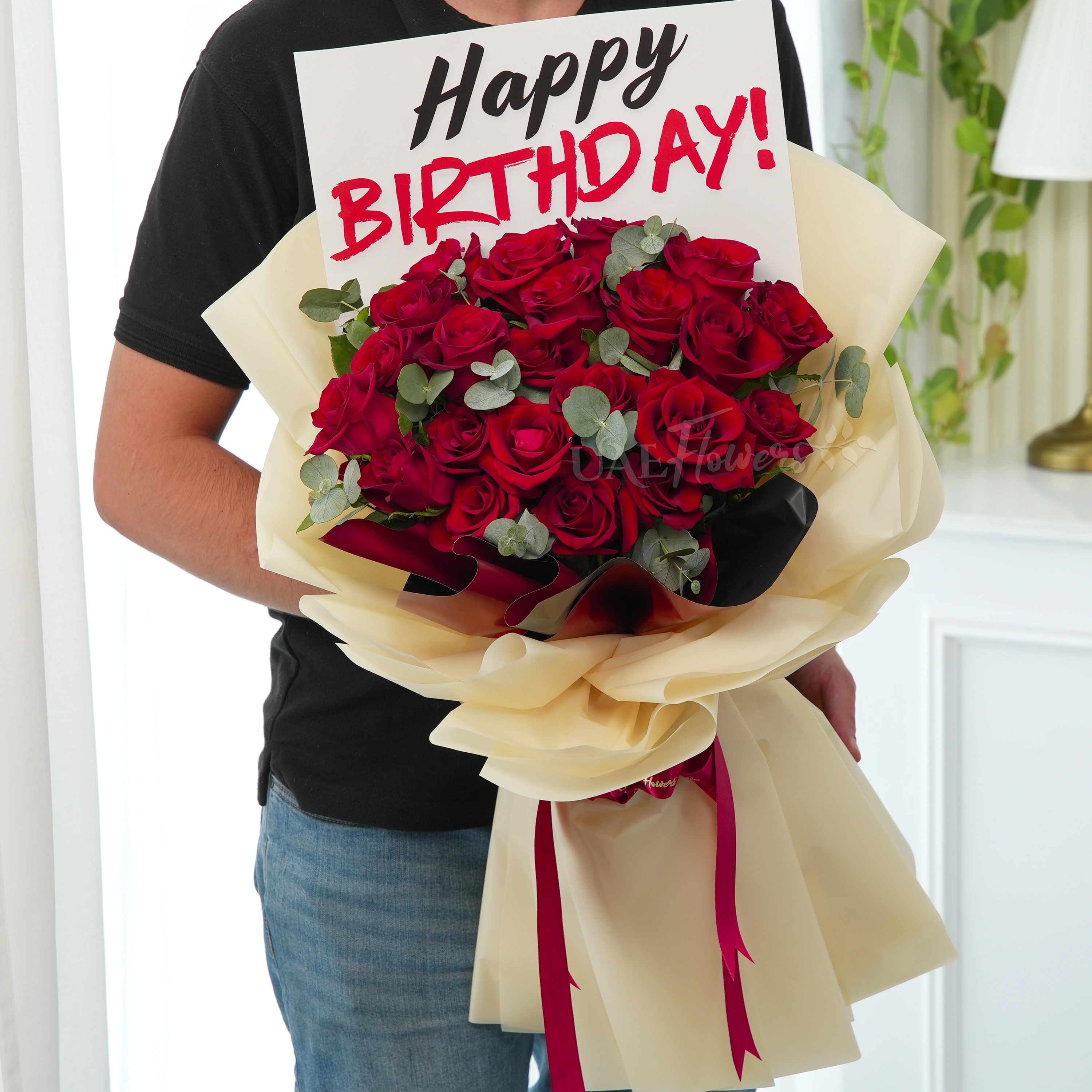 Bouquet of 20 red roses with green fillers in nice wrapping.