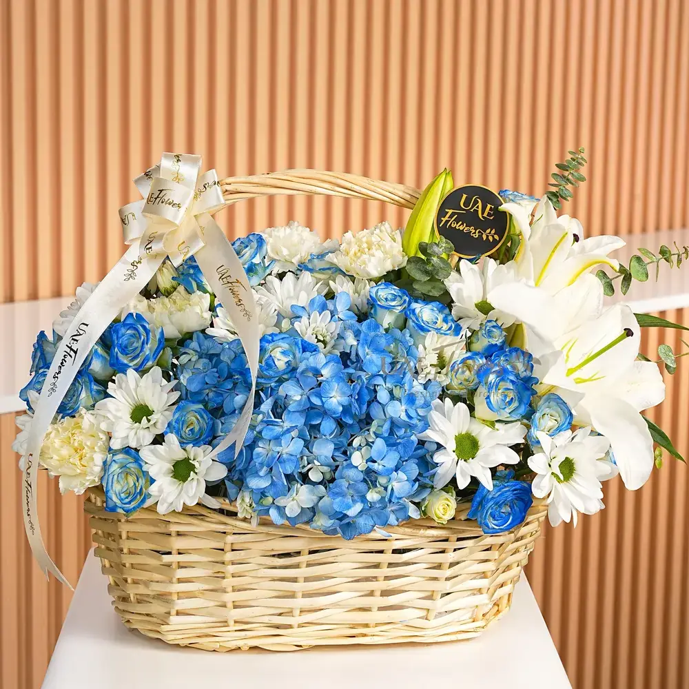 1 blue hydrangea, 1 Regan chic chrysanthemum, 6 white carnations, 15 blue sprayed roses