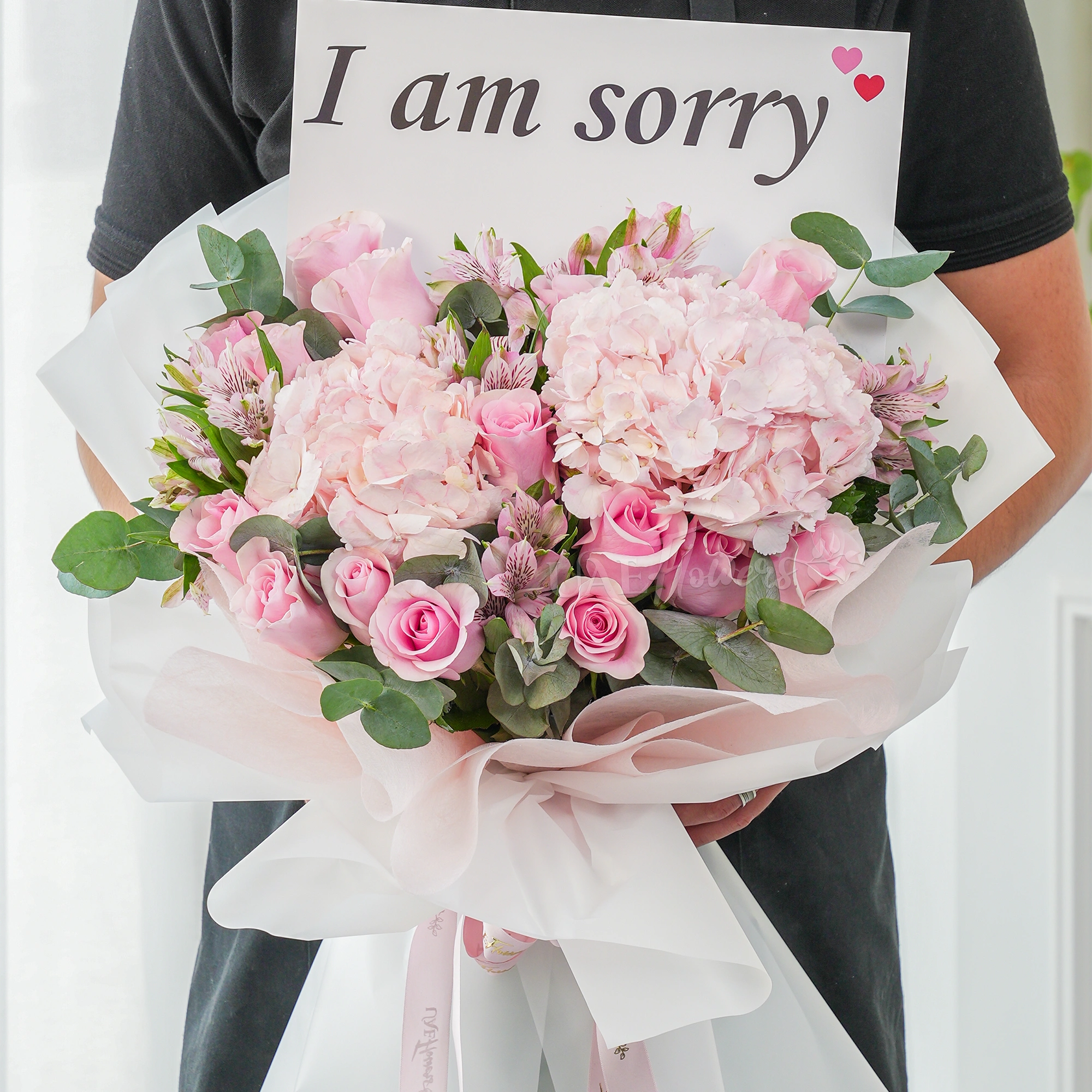 Bouquet of 12 pink roses, 2 pink hydrangeas and 3 pink alstromeria with green fillers