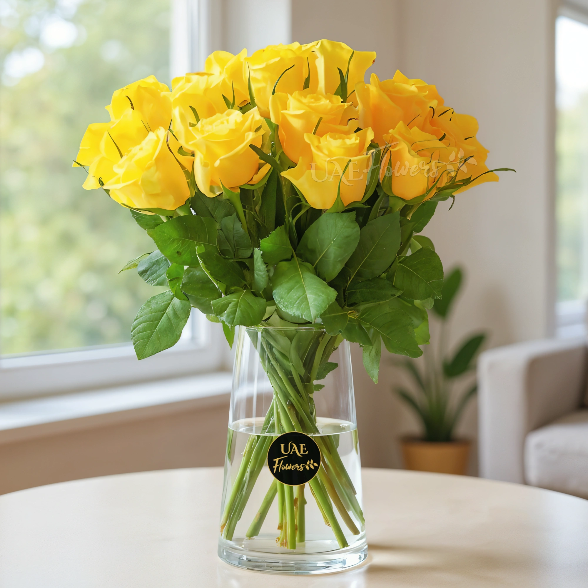 18 yellow roses in a glass vase