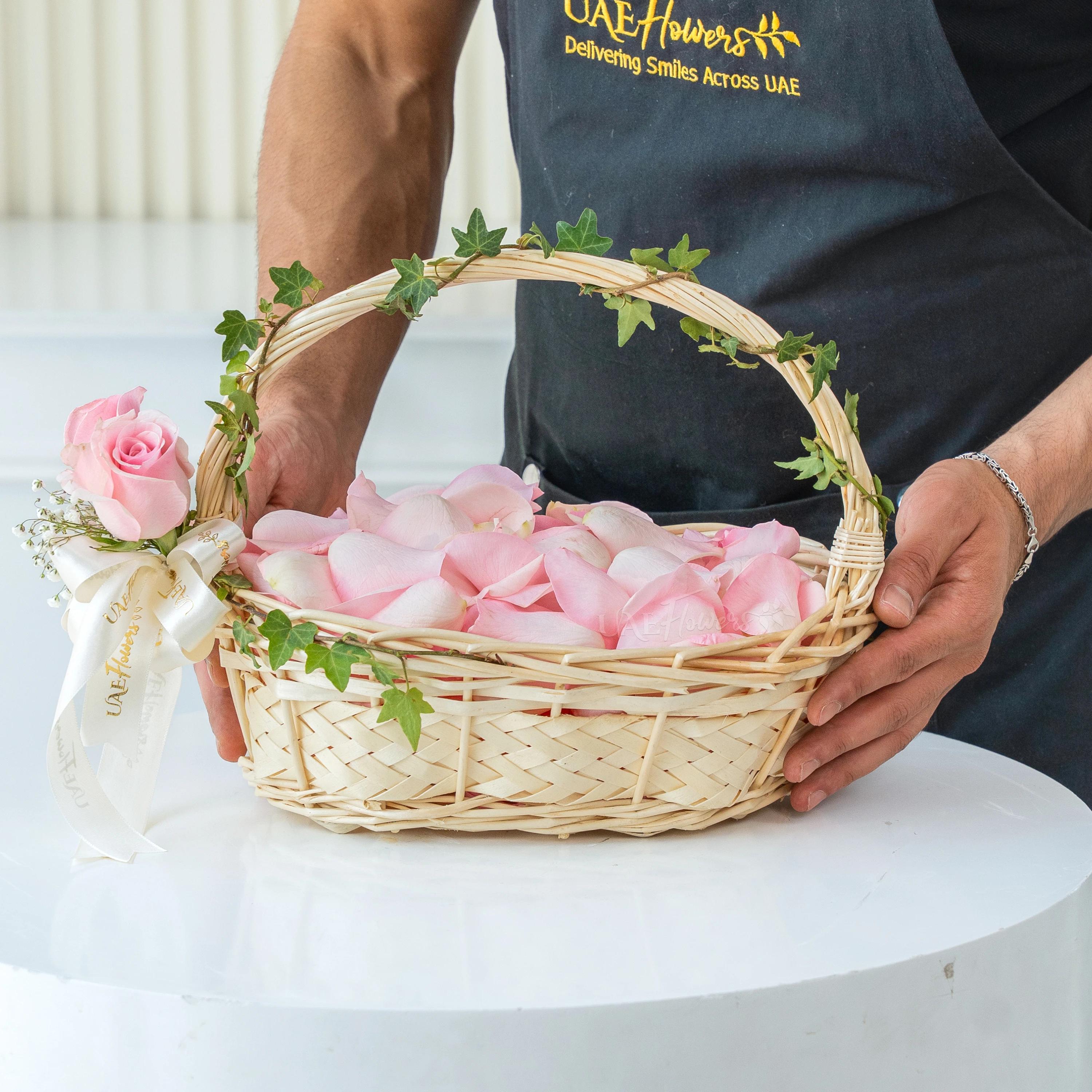 small basket of fresh pink rose petals