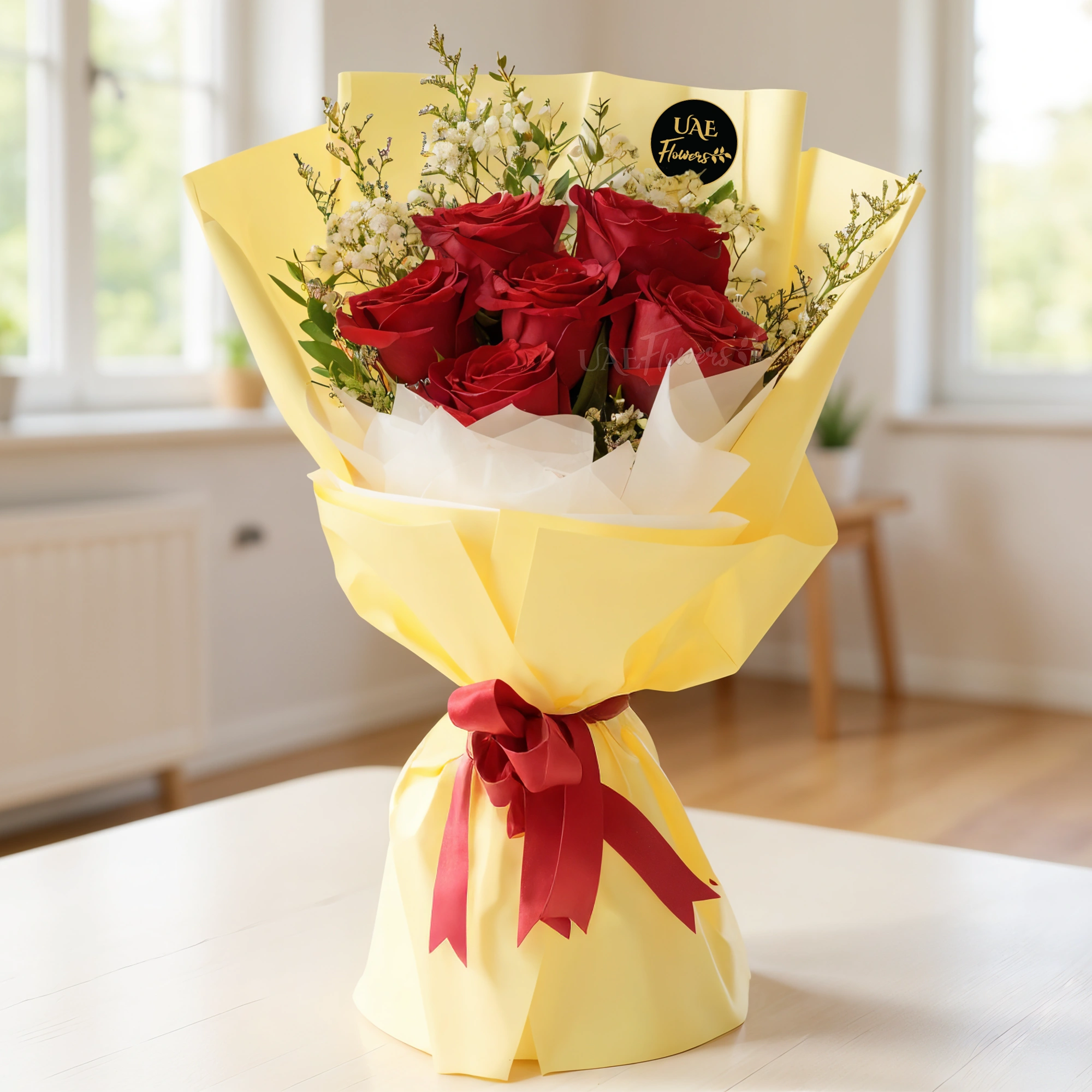 bouquet of 6 red roses with limonium and green fillers