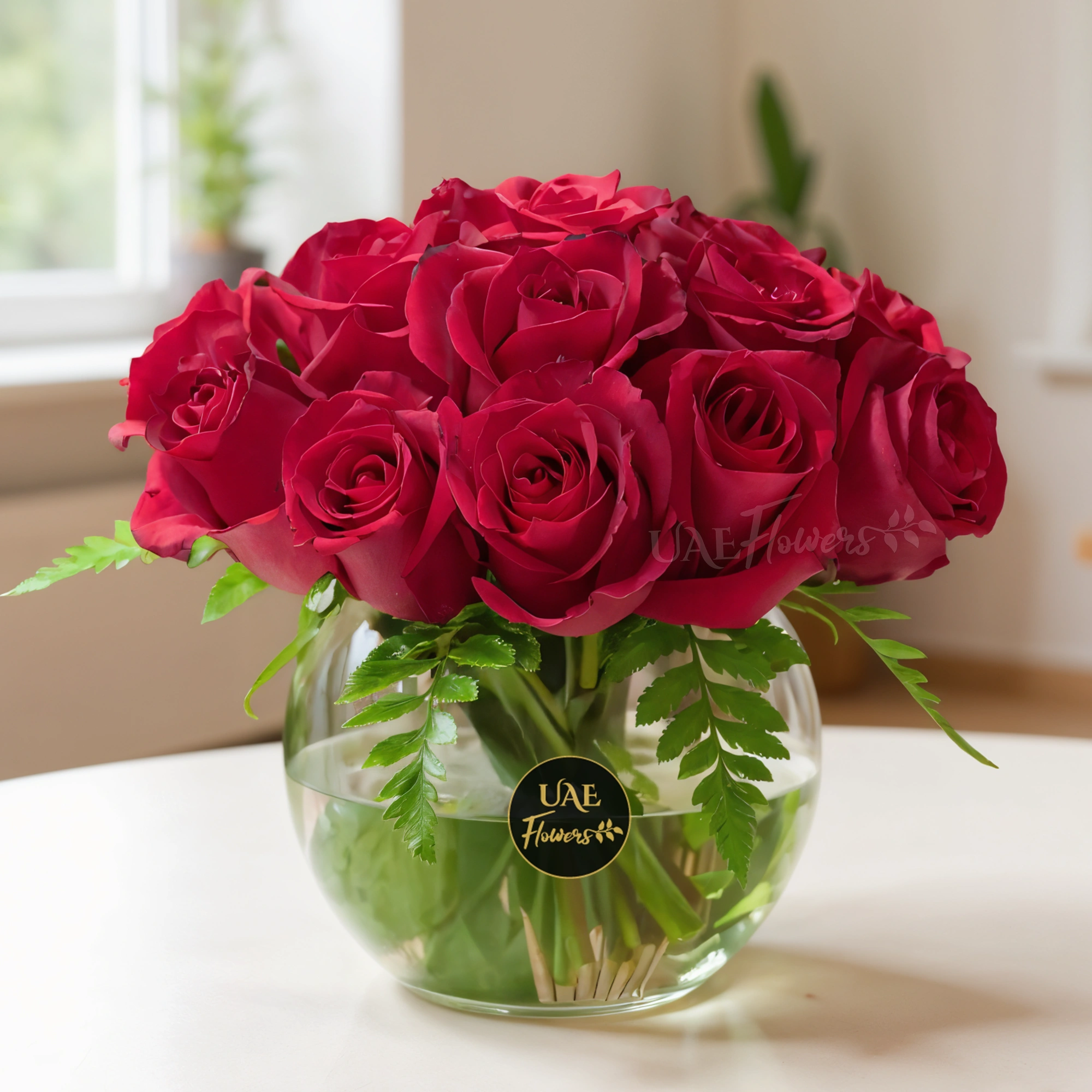 vase of 15 red roses paired with green fillers