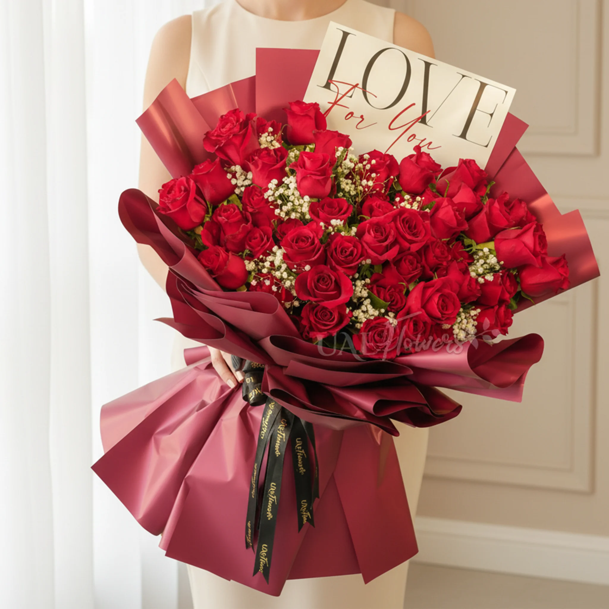 Bouquet of 50 red roses with baby’s breath