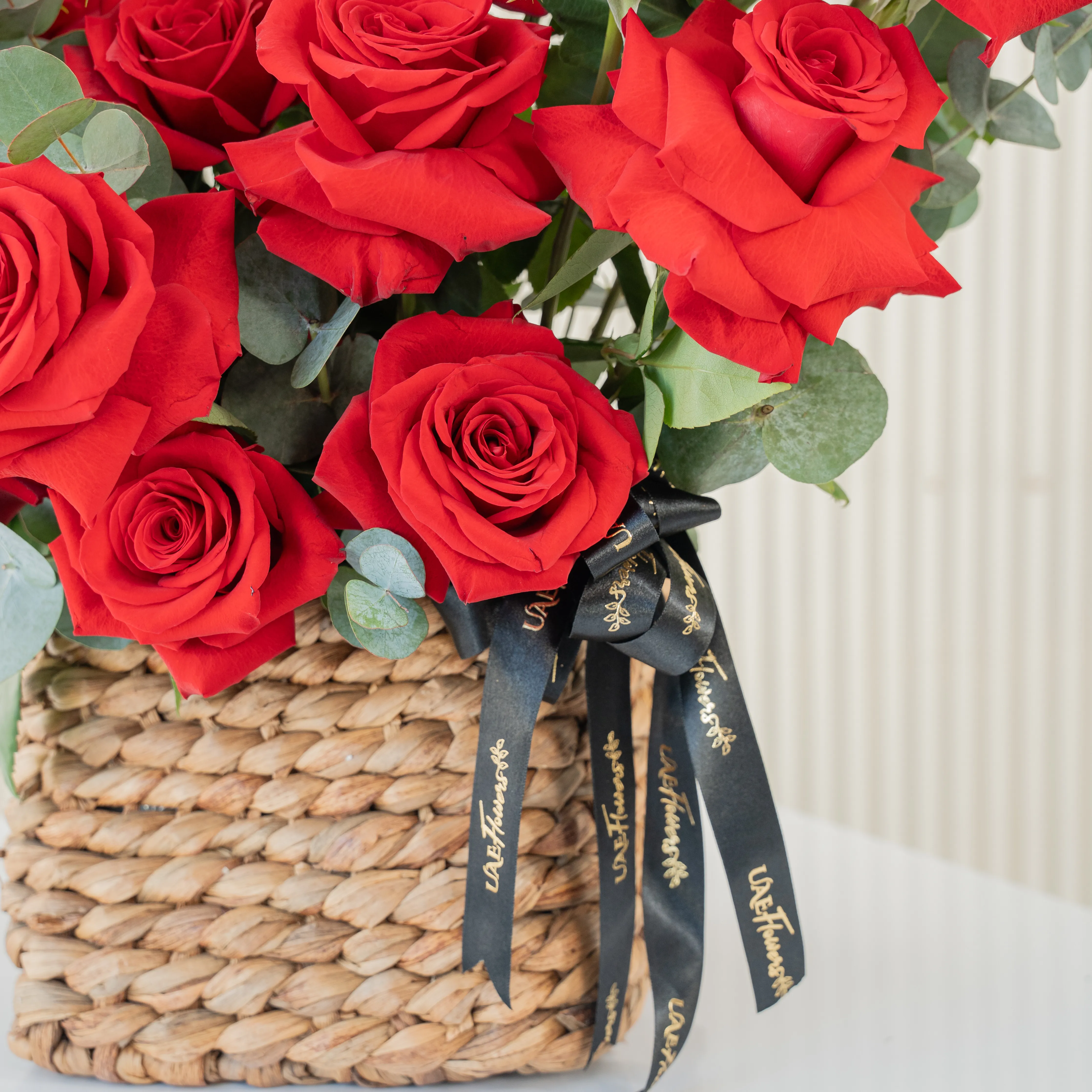 20 Opened Red Roses in a Basket with Fillers