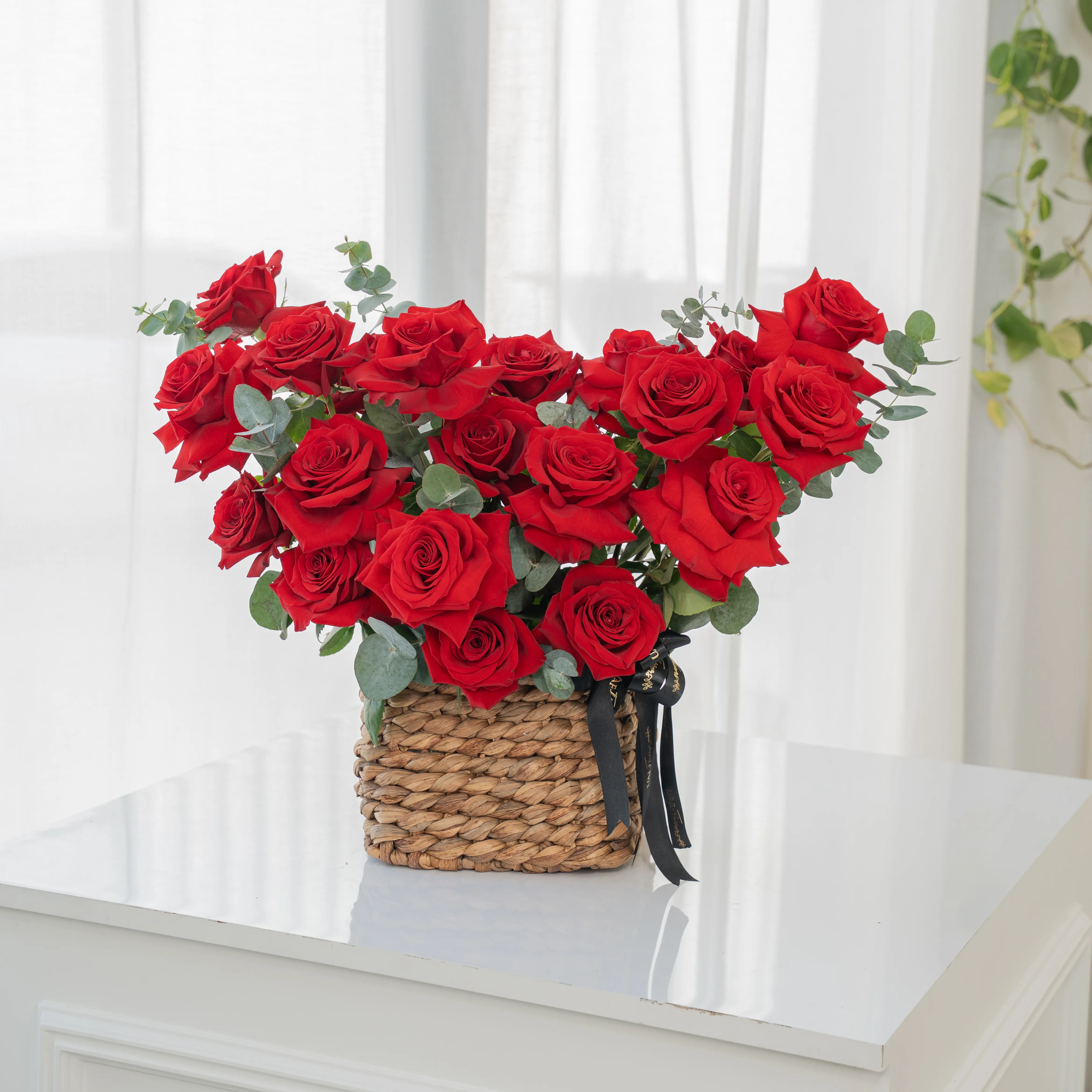 20 Opened Red Roses in a Basket with Fillers