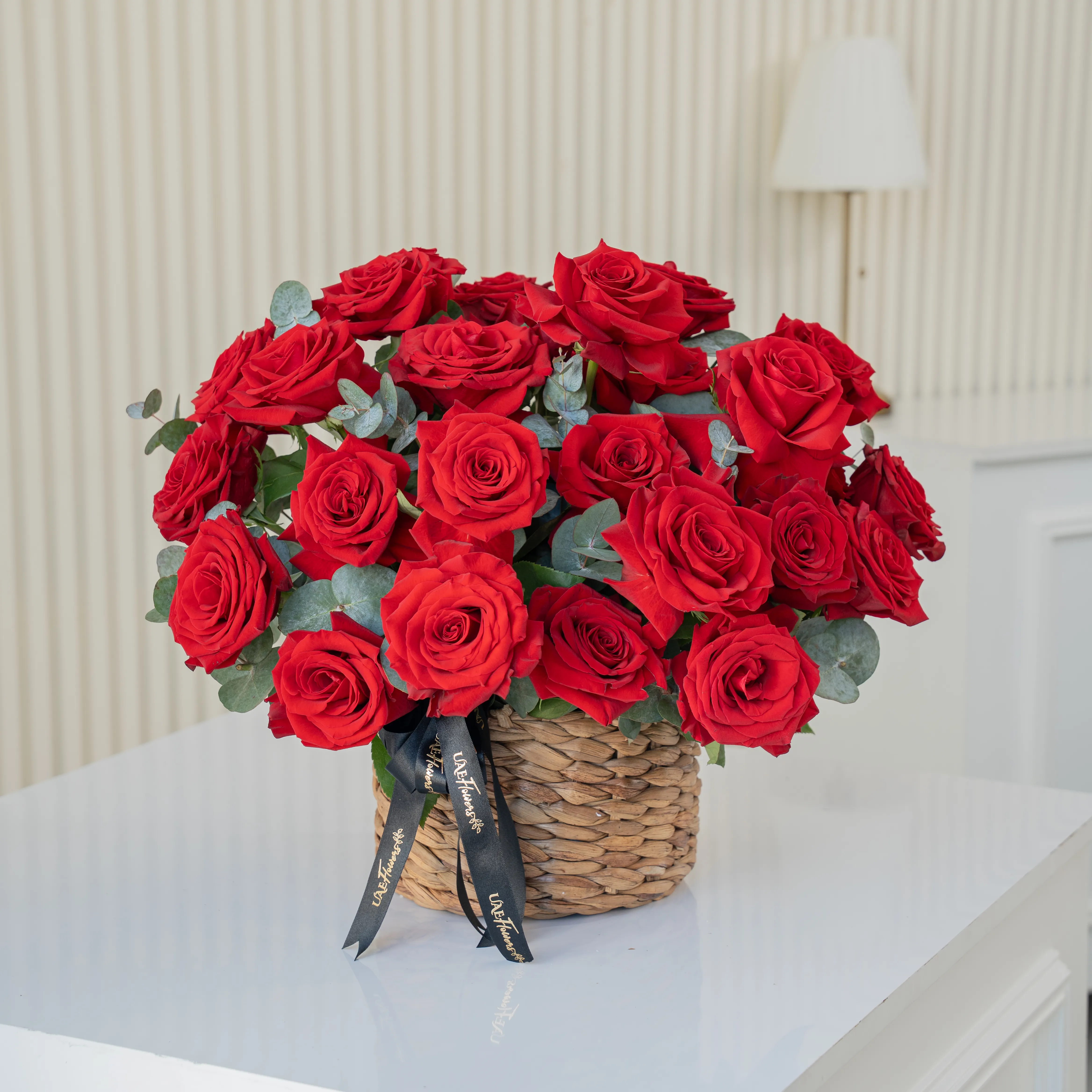 20 Opened Red Roses in a Round Basket