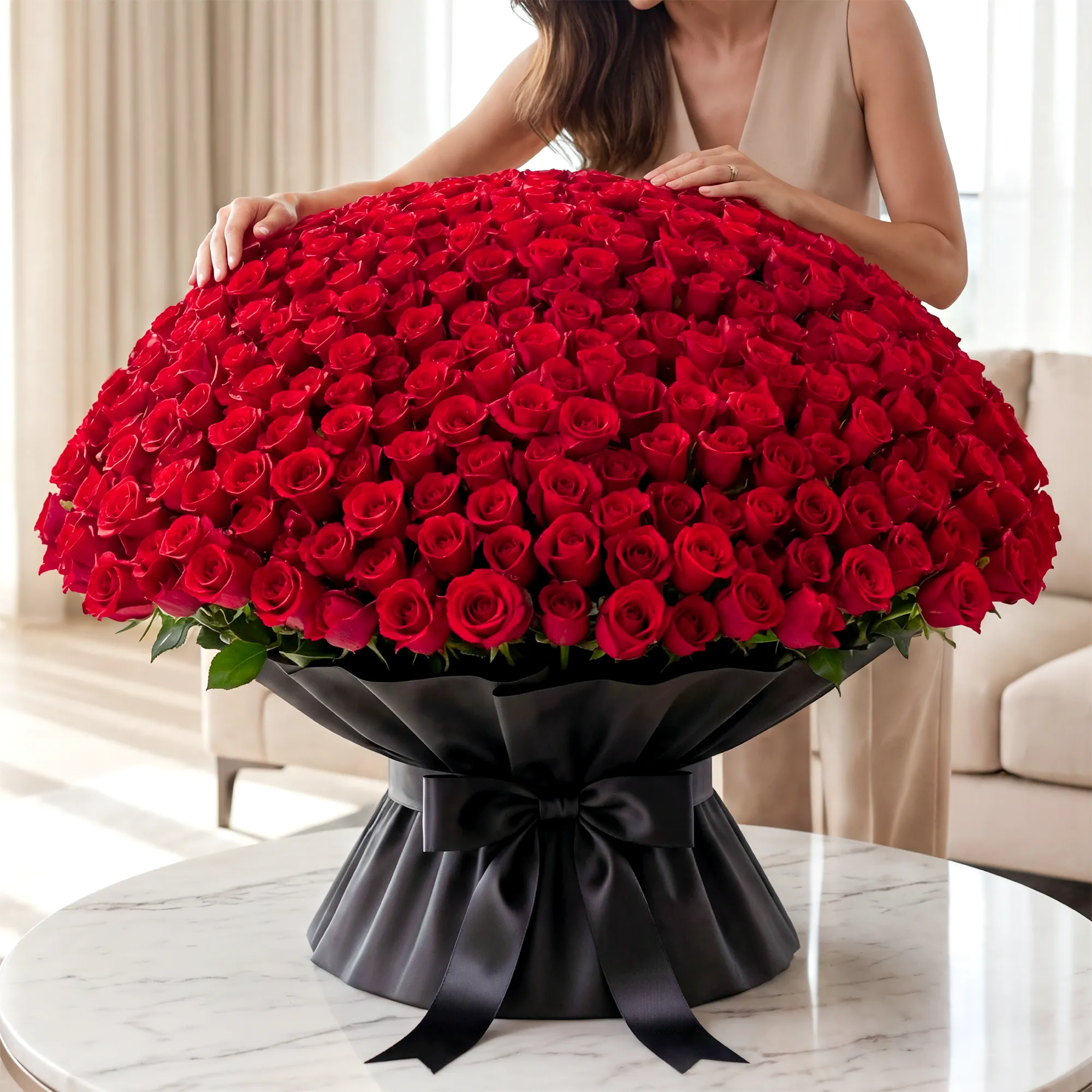 1000 red roses arranged in a grand bouquet with black wrapping, a dramatic romantic gift with same-day delivery across the UAE. Perfect for proposals and celebrations.