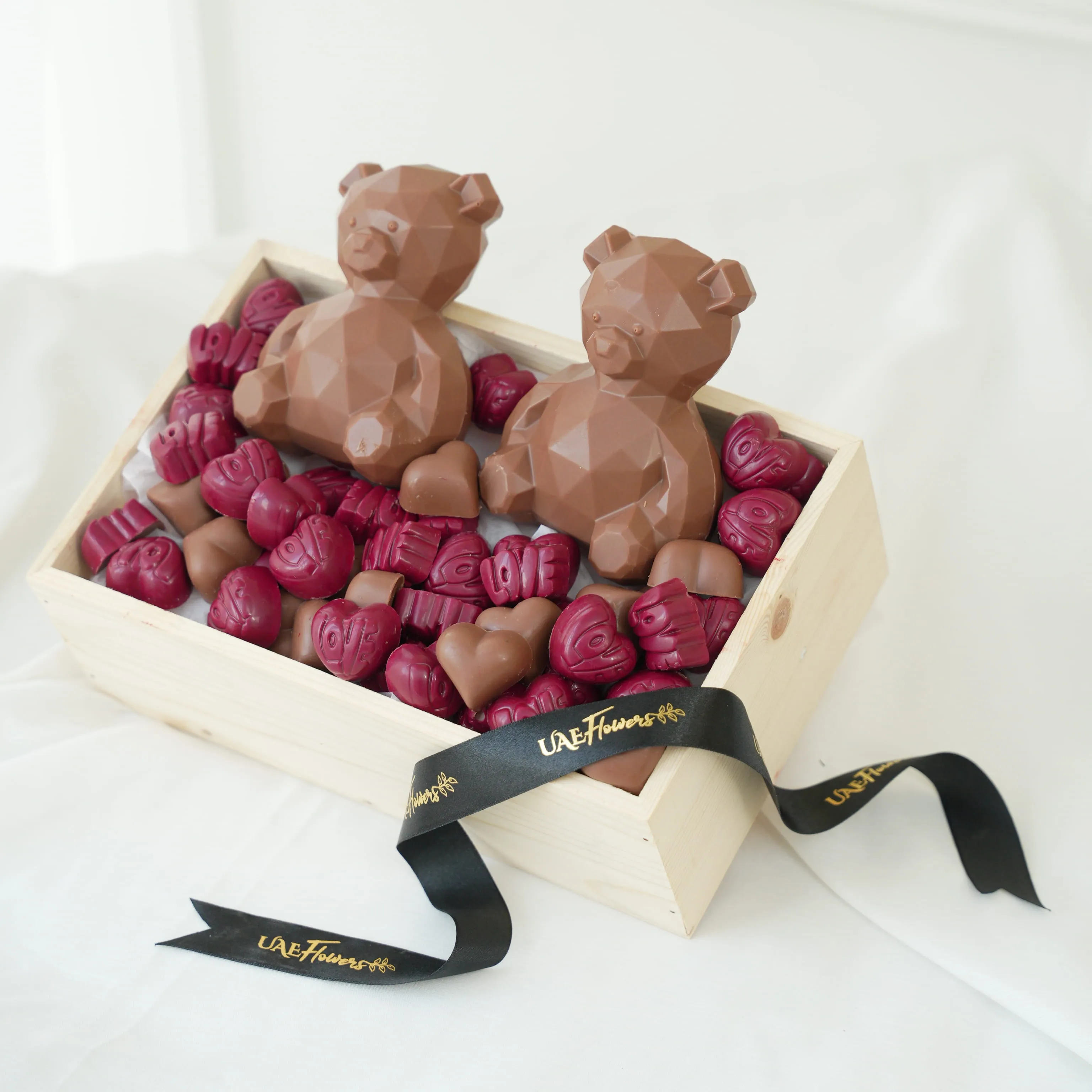 2 teddy bears (100 gms each) and 650 gms of assorted chocolates