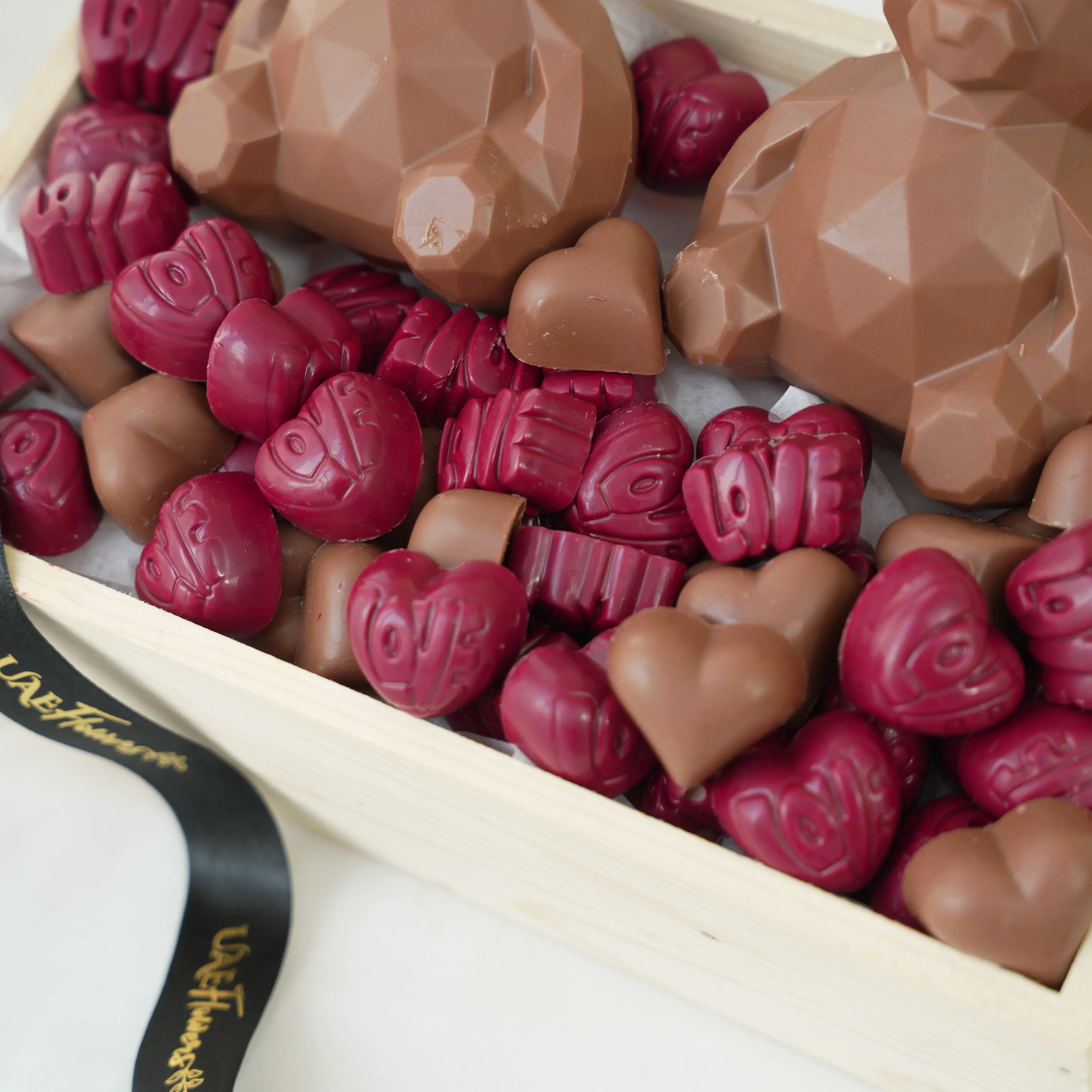 2 teddy bears (100 gms each) and 650 gms of assorted chocolates