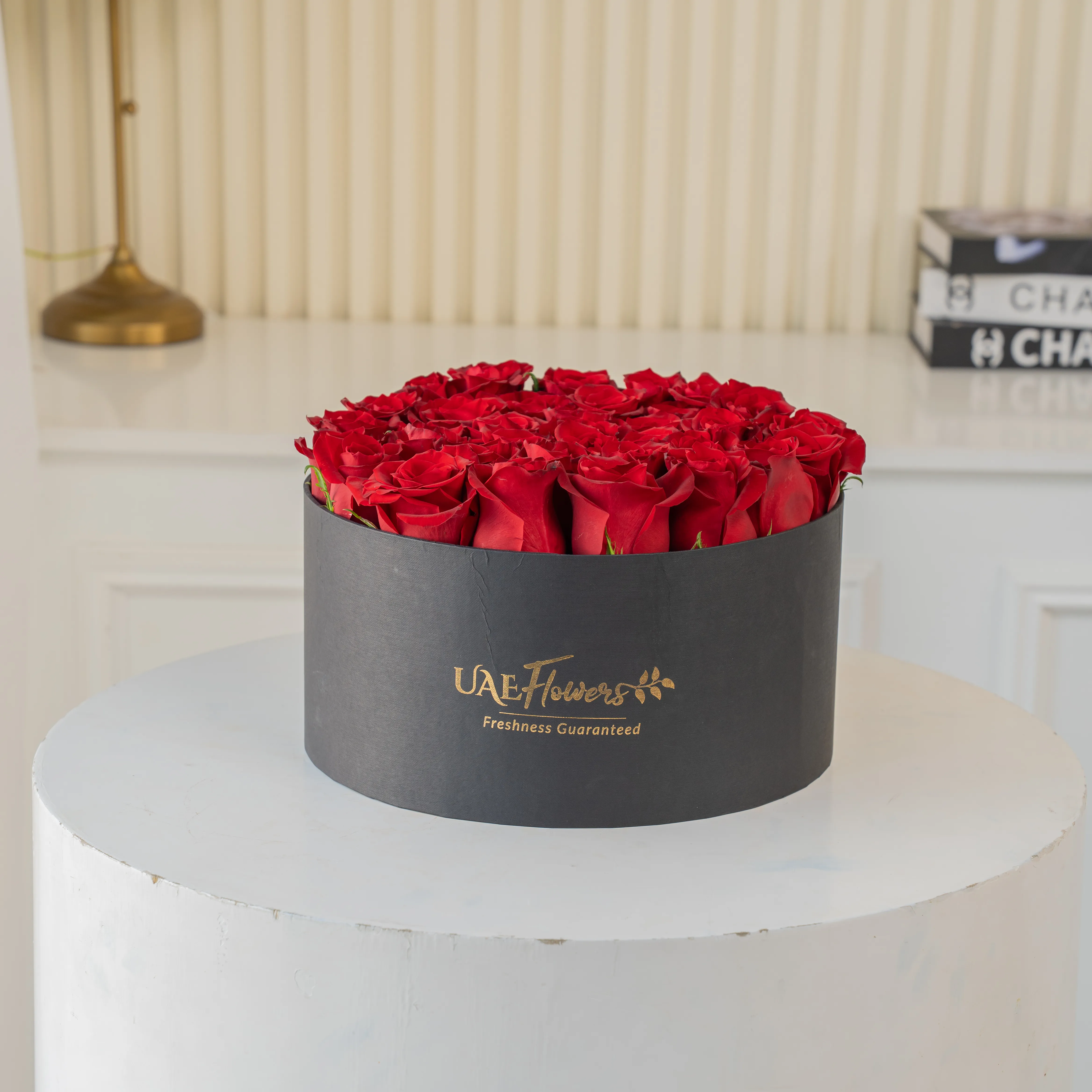 30 Red Roses in a premium black round box