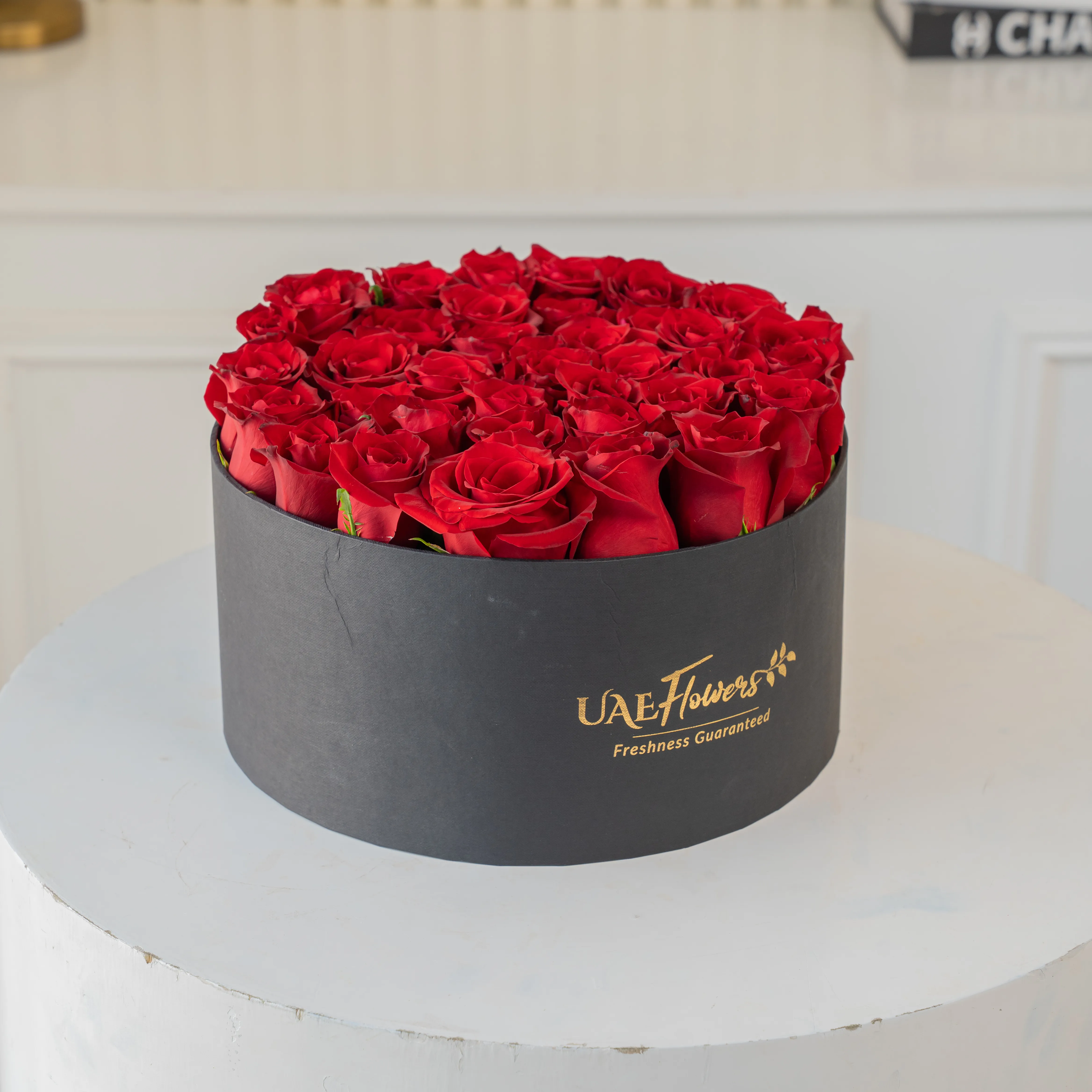 30 Red Roses in a premium black round box