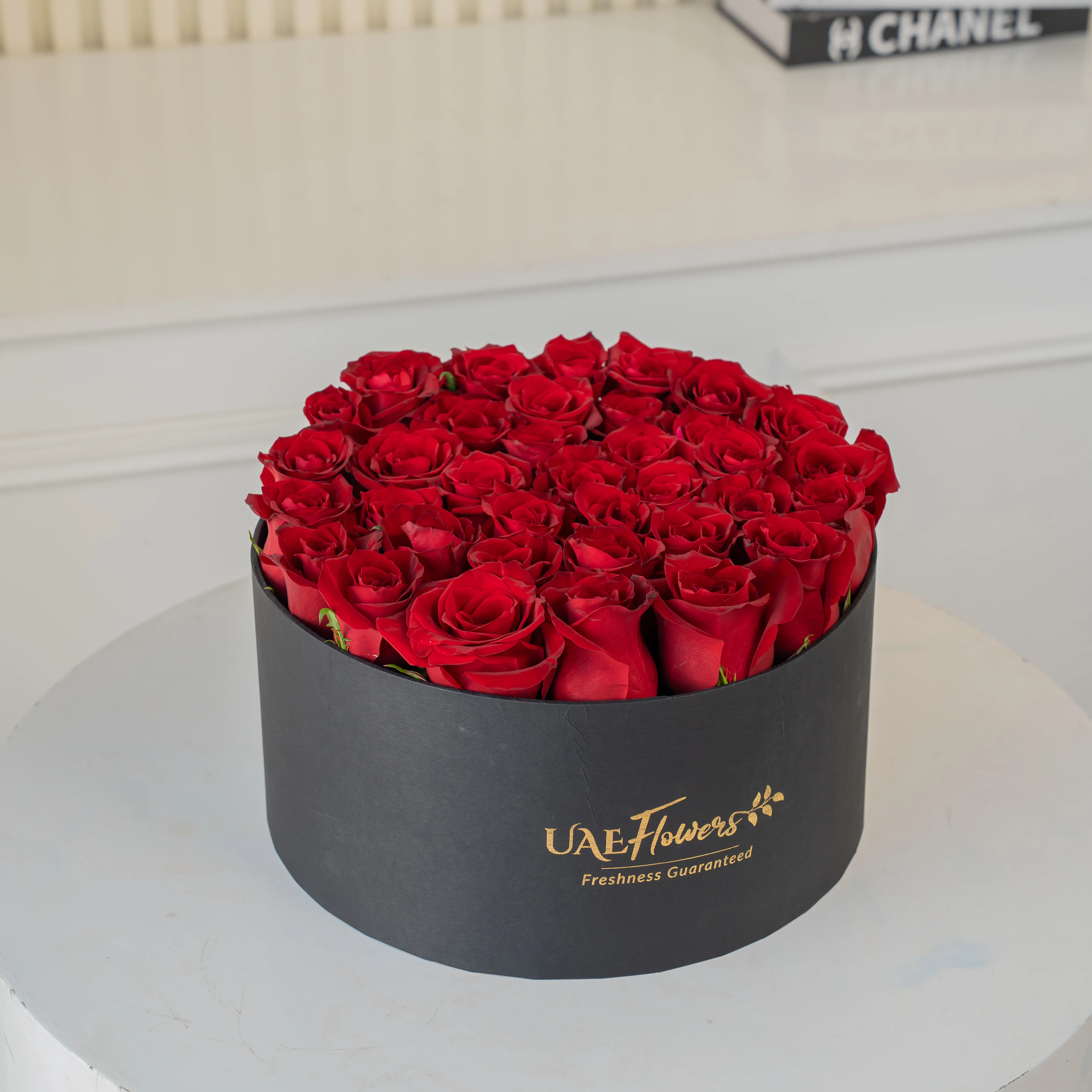 30 Red Roses in a premium black round box