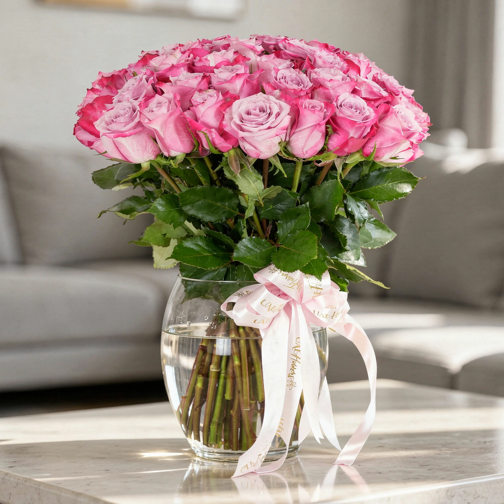 40 purple roses and green fillers, tied with pink ribbons