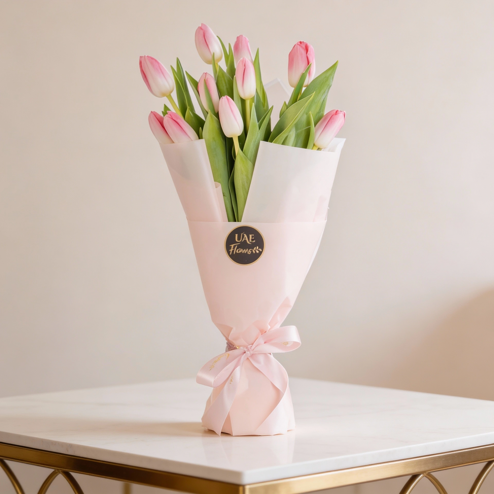 10 pink tulips is wrapped in stylish pink paper