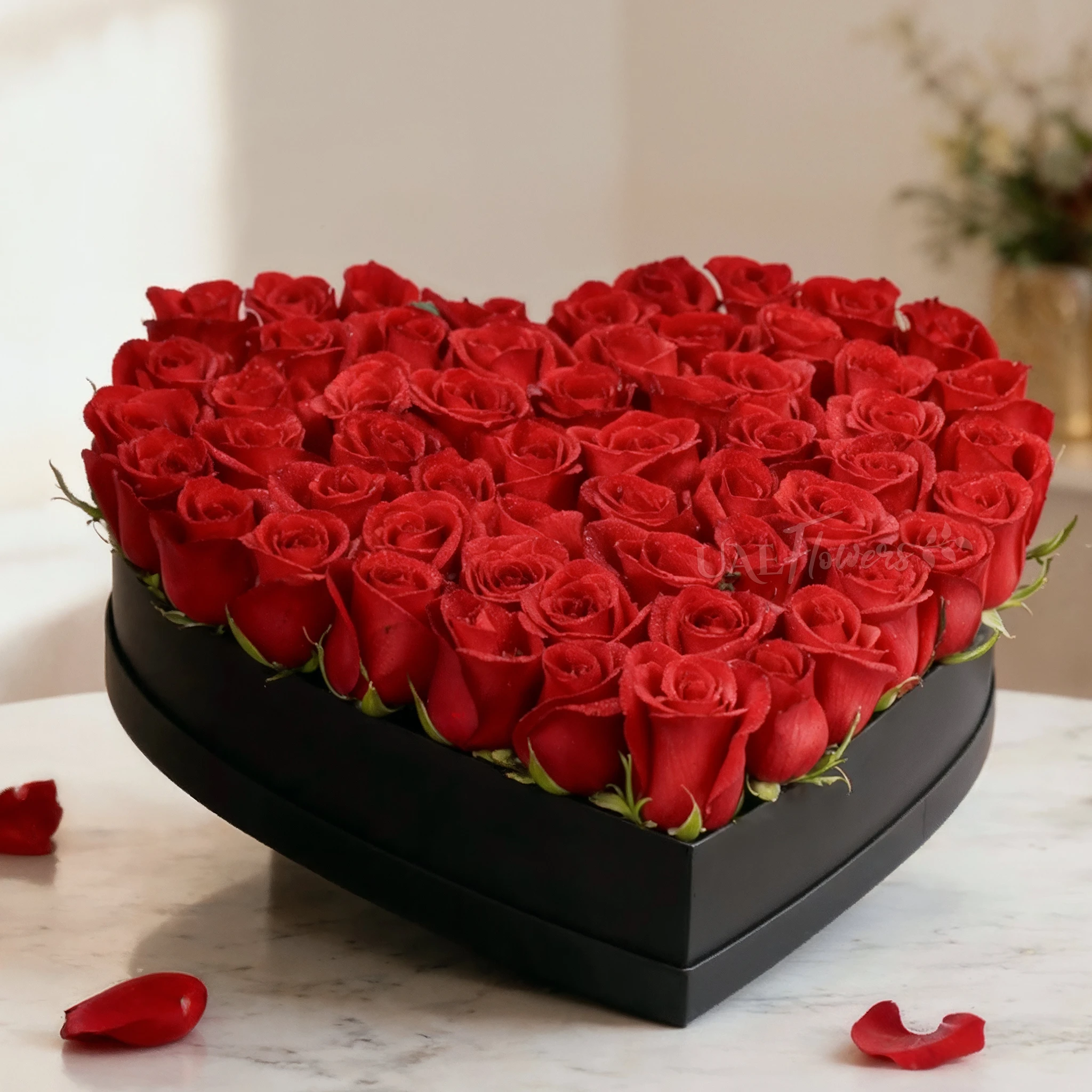 60 red roses in a heart shaped box