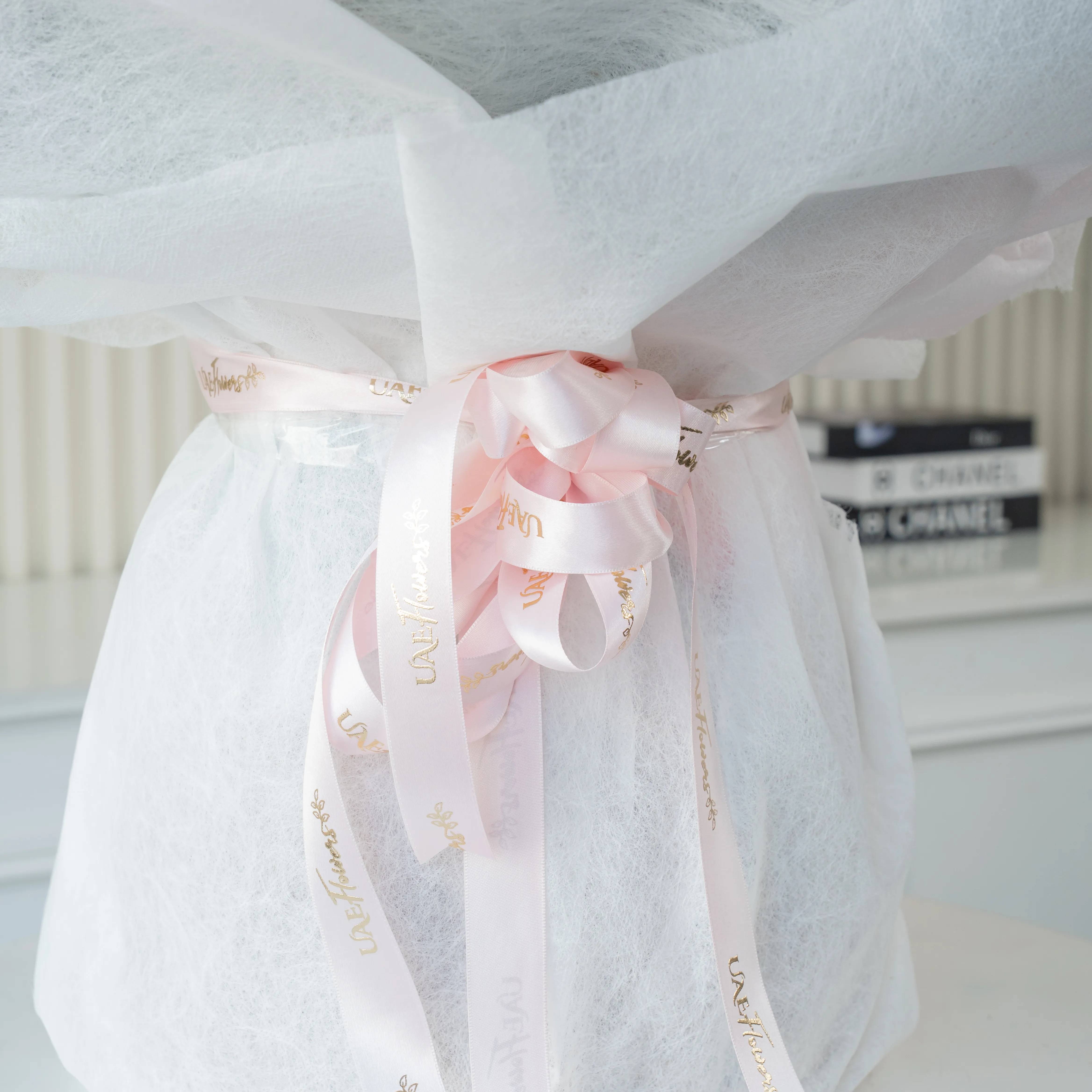 bouquet of pink roses, gerberas,  white spray roses, and hydrangea