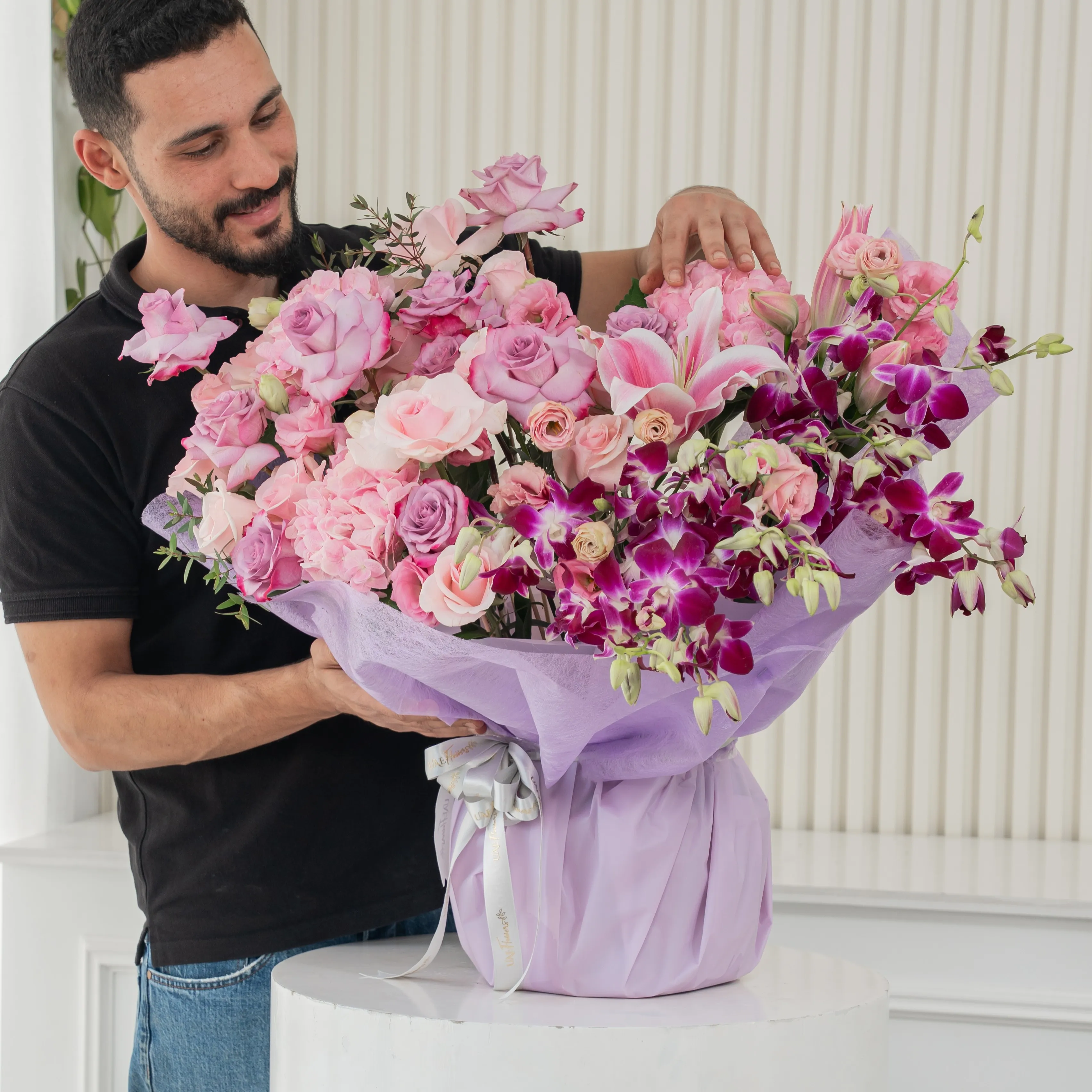 bouquet with pink, lilies, roses, hydrangeas, purple orchids