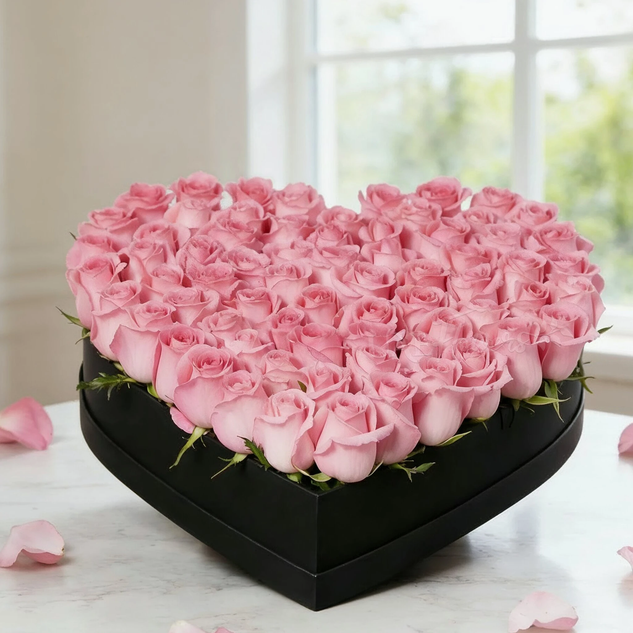 60 pink roses in a black heart shaped box