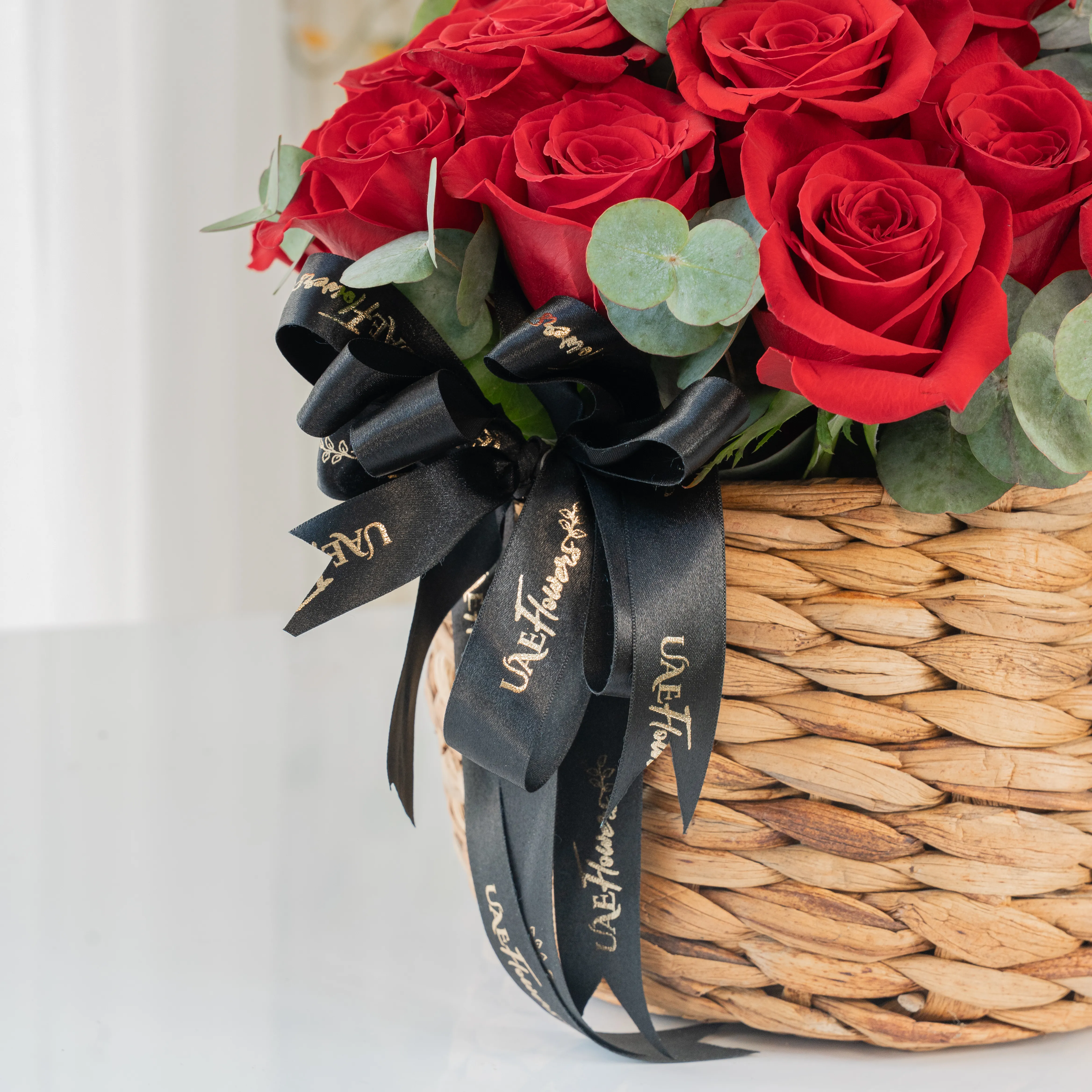 25 Red Roses in a Round Basket