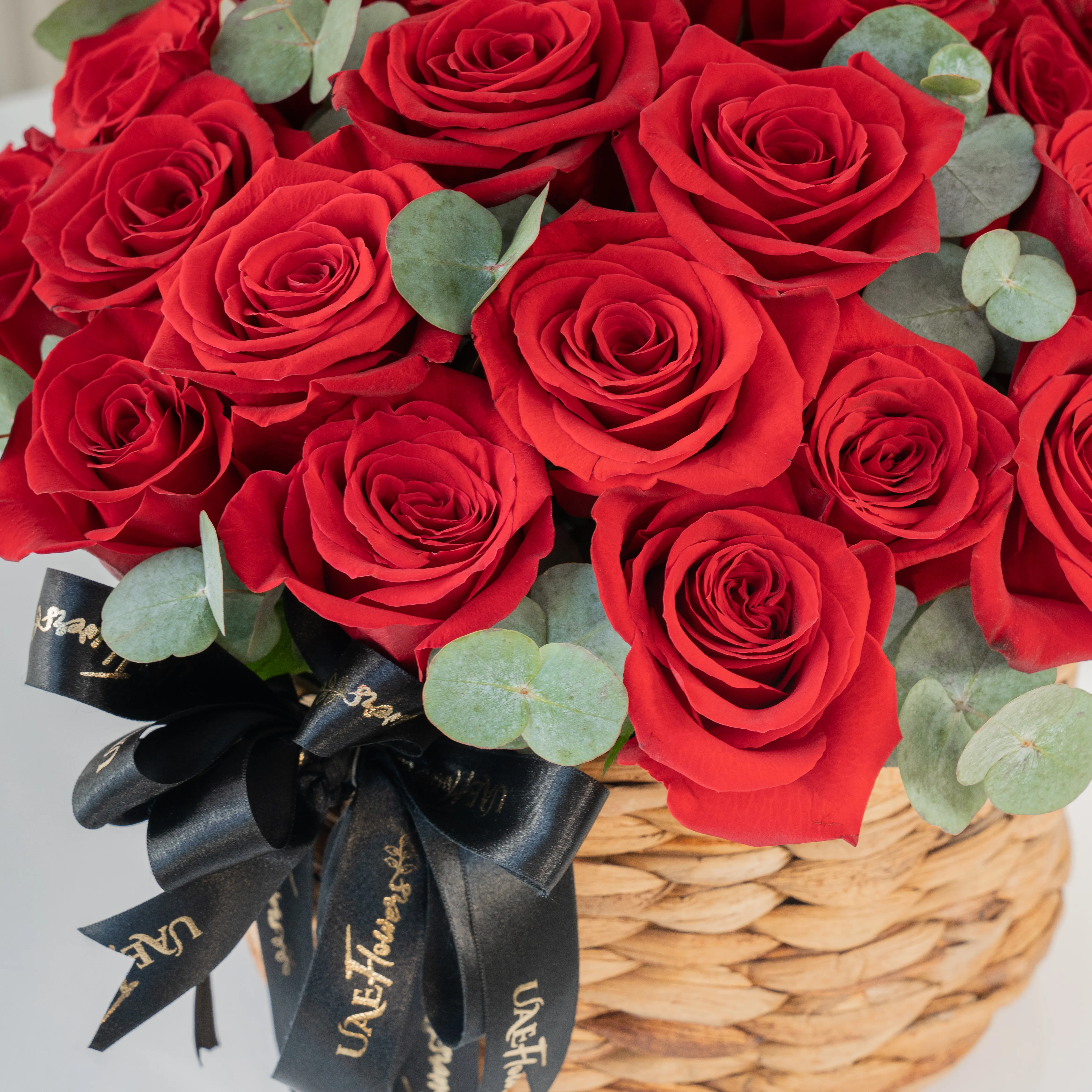 25 Red Roses in a Round Basket