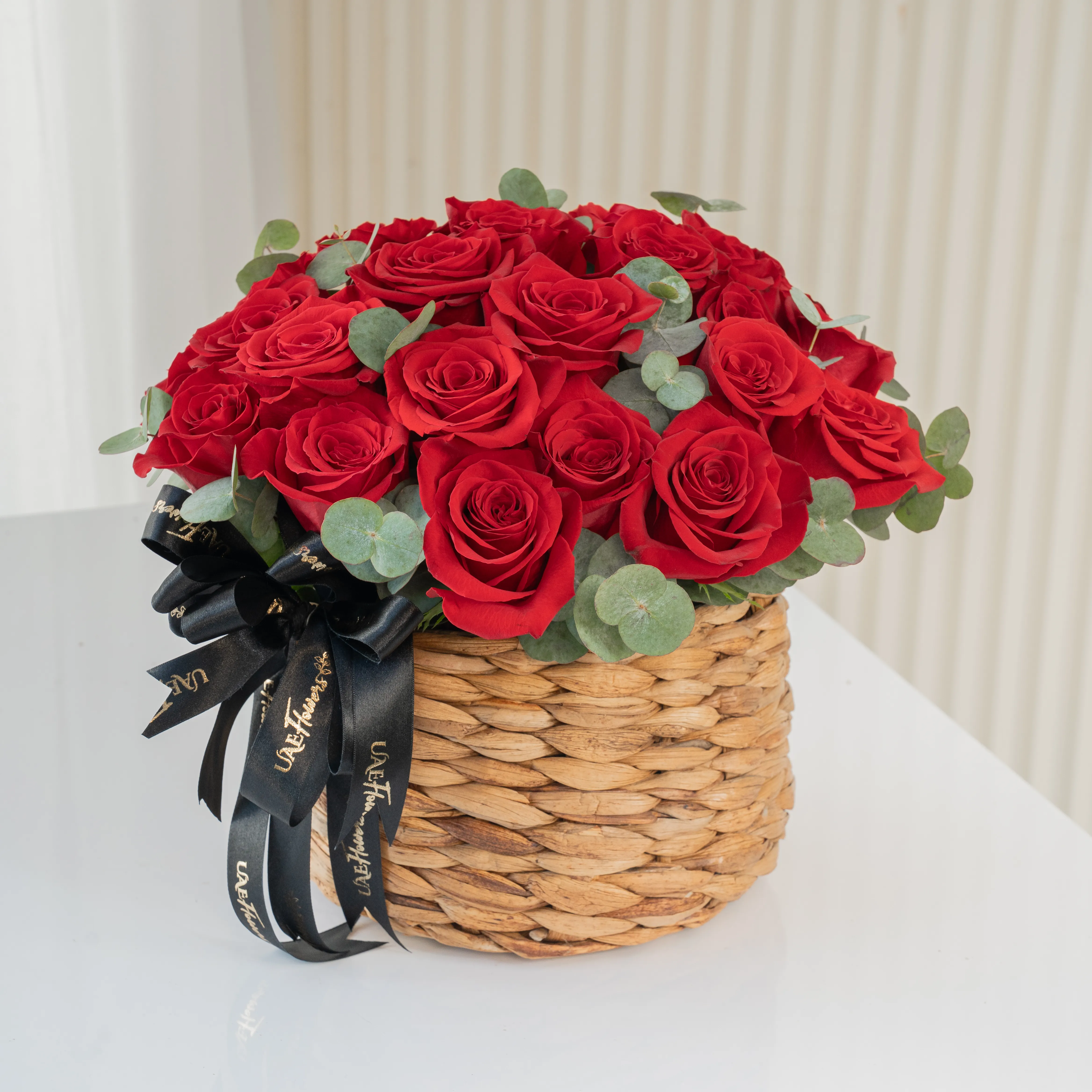 25 Red Roses in a Round Basket