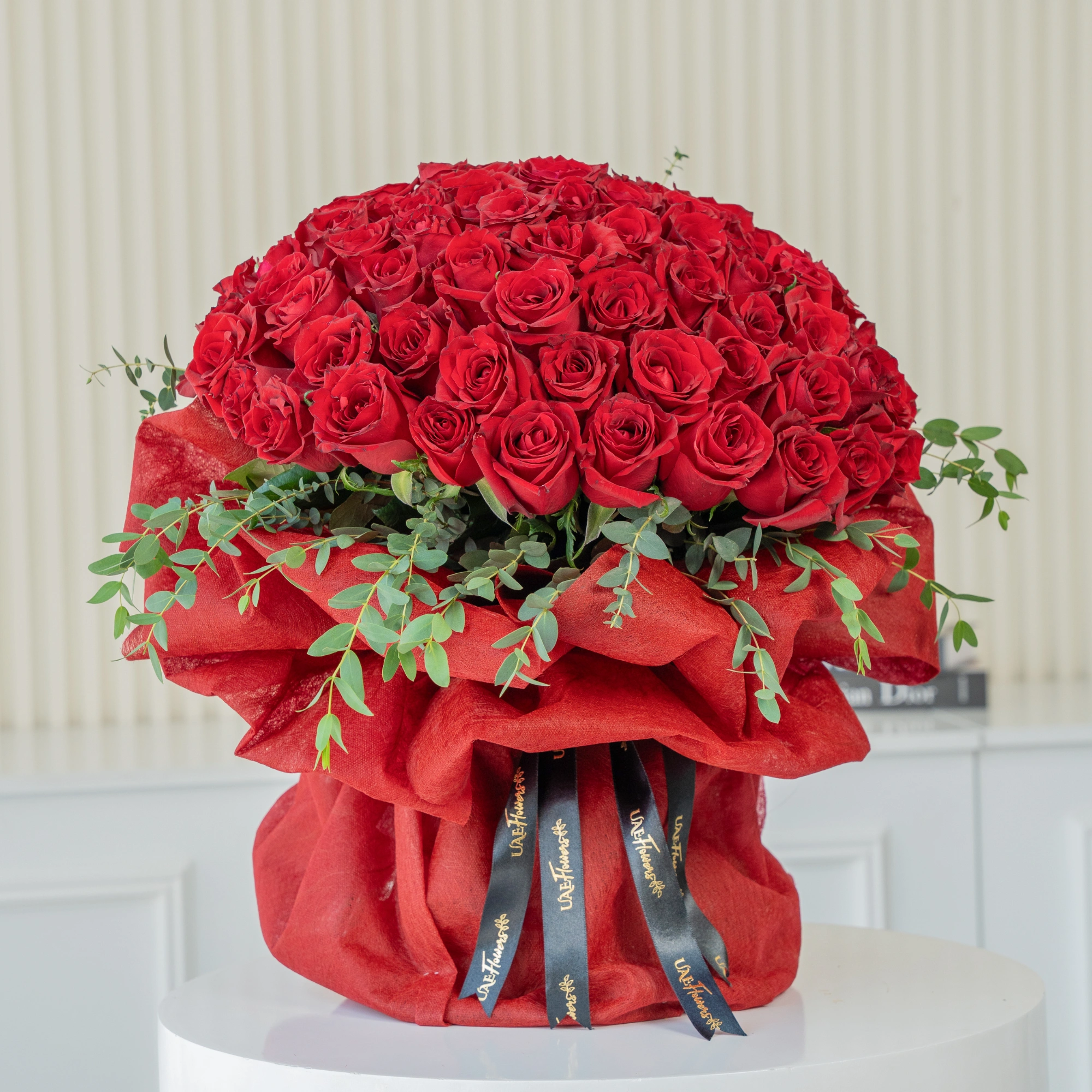 Bouquet of 60 Red Roses with green fillers in nice wrapping