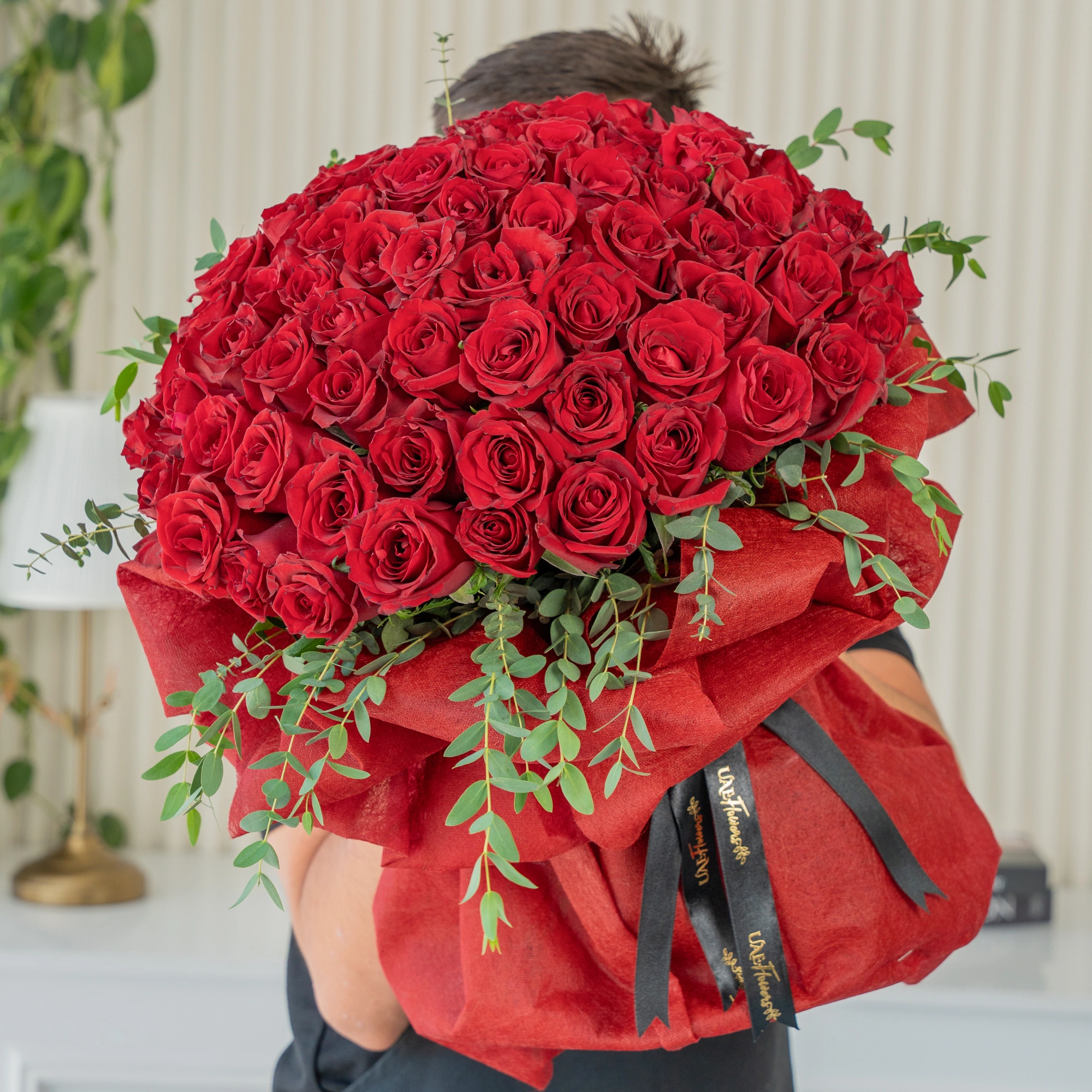 Bouquet of 60 Red Roses with green fillers in nice wrapping