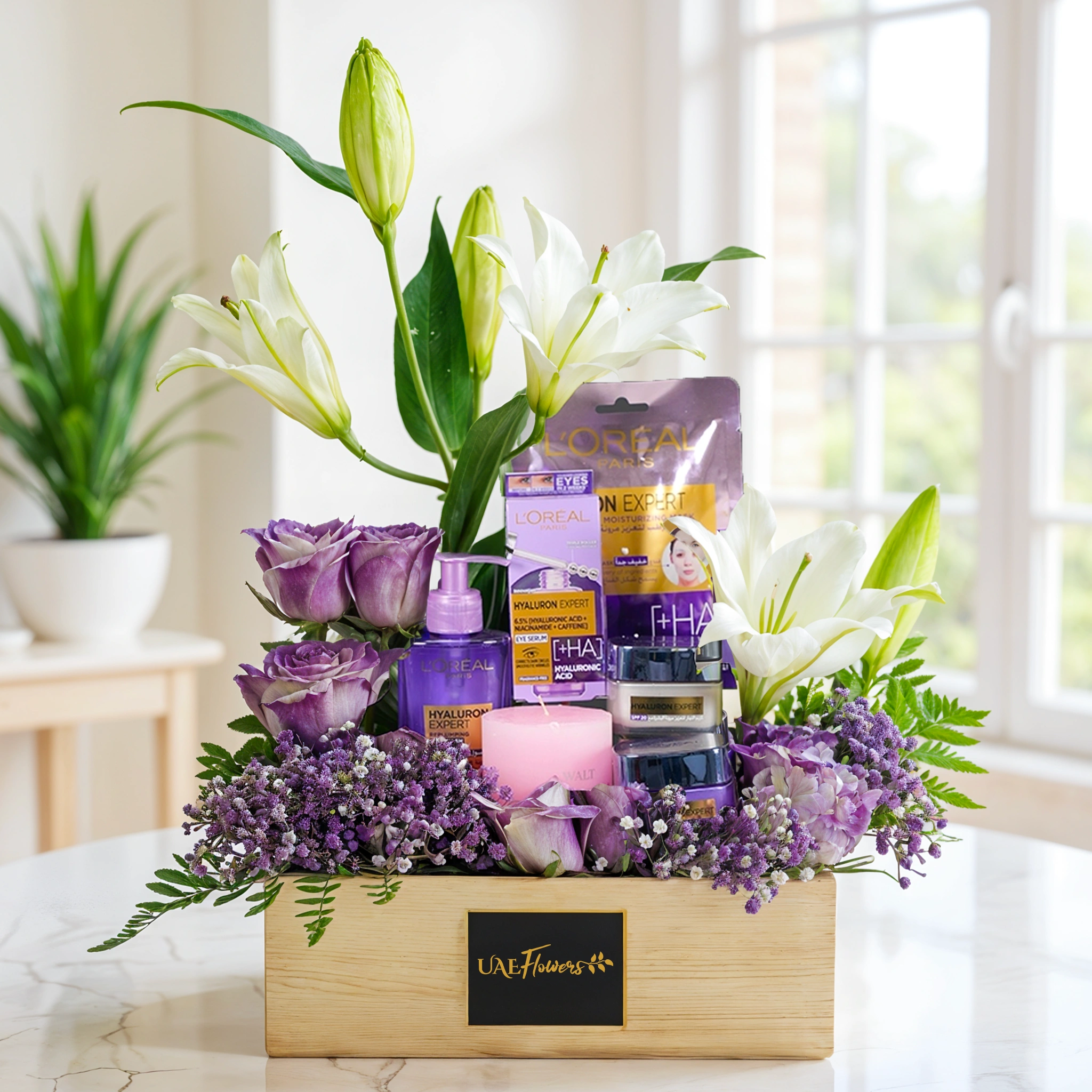 L'Oreal Hyaluron set, candle, 2 white lilies, 10 purple-sprayed roses,