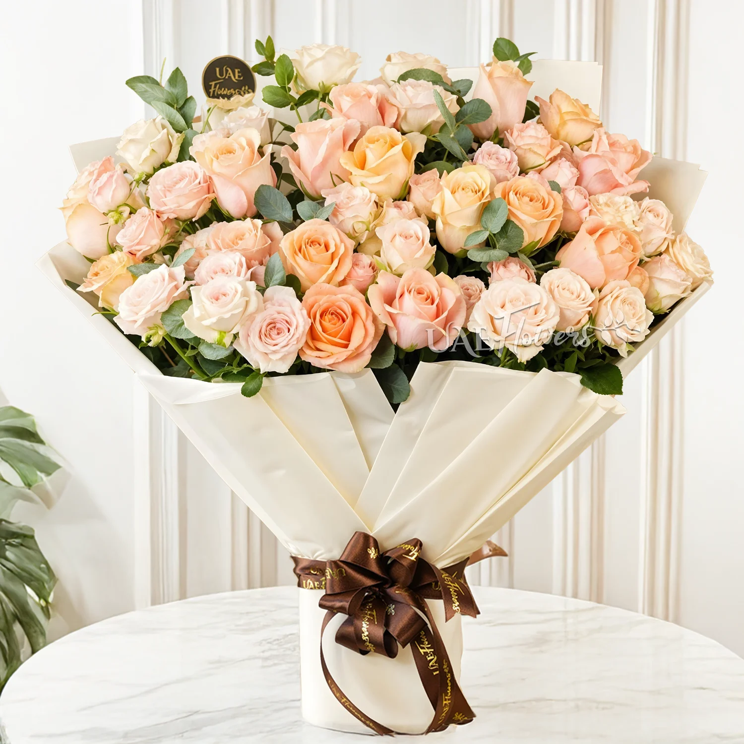 6 pink spray roses and 20 mixed pastel roses