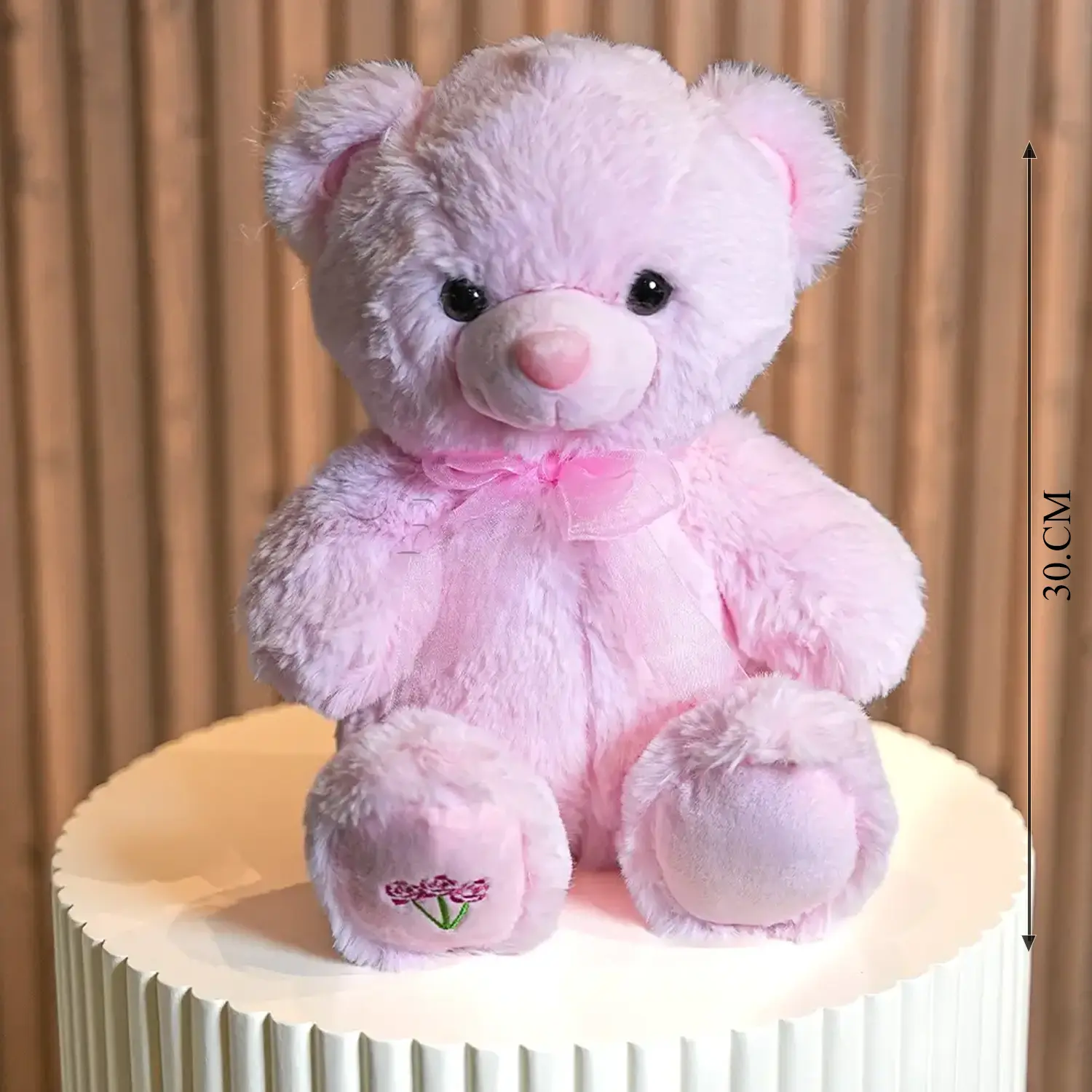 Bouquet of 8 white and peach roses and 2 peach spray roses with green fillers in nice wrapping, 1 kg chocolate cake and a small pink teddy bear.
