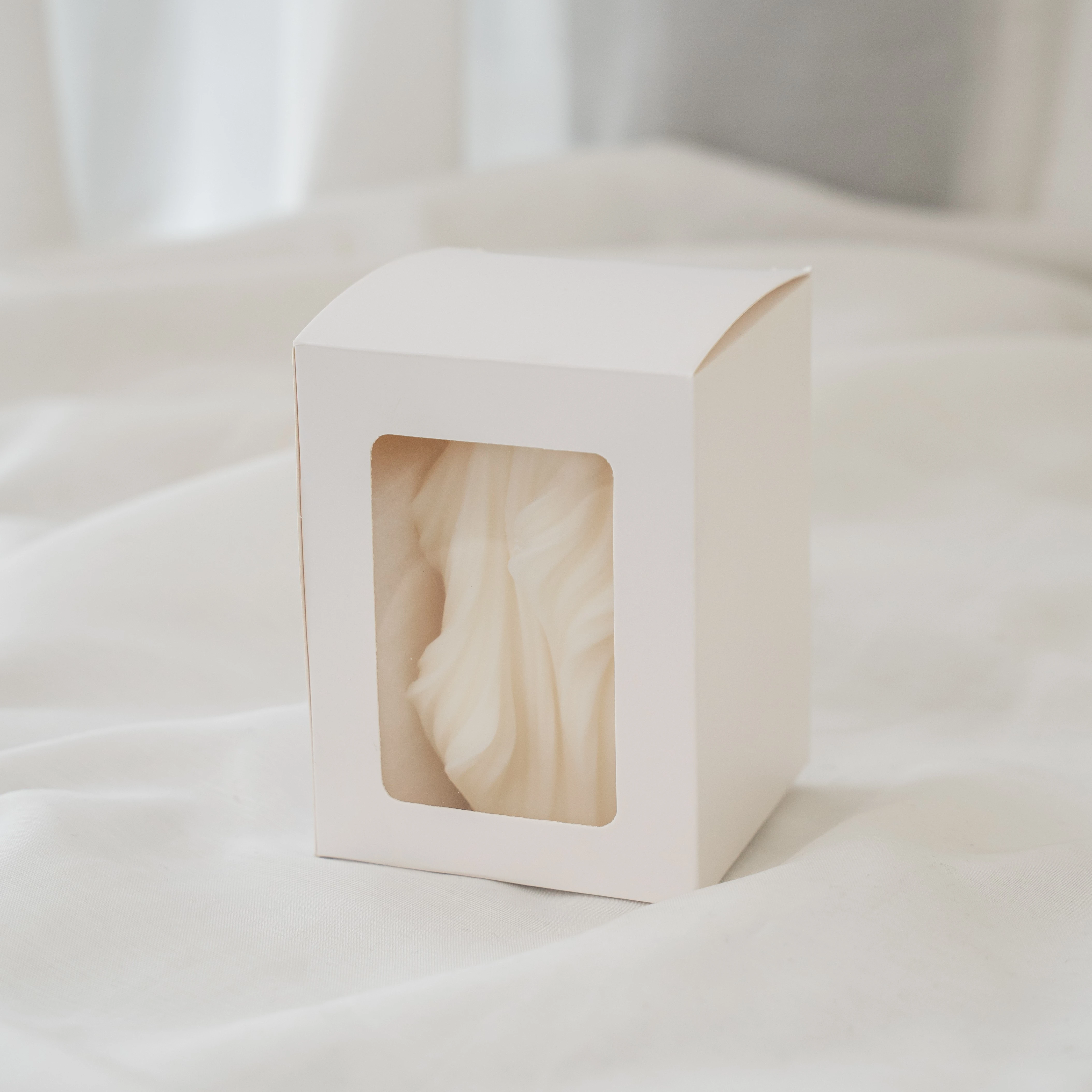Handcrafted Ethereal Sculpted Candle in Ivory Wax with Flowing Contemporary Design for Modern Home Décor