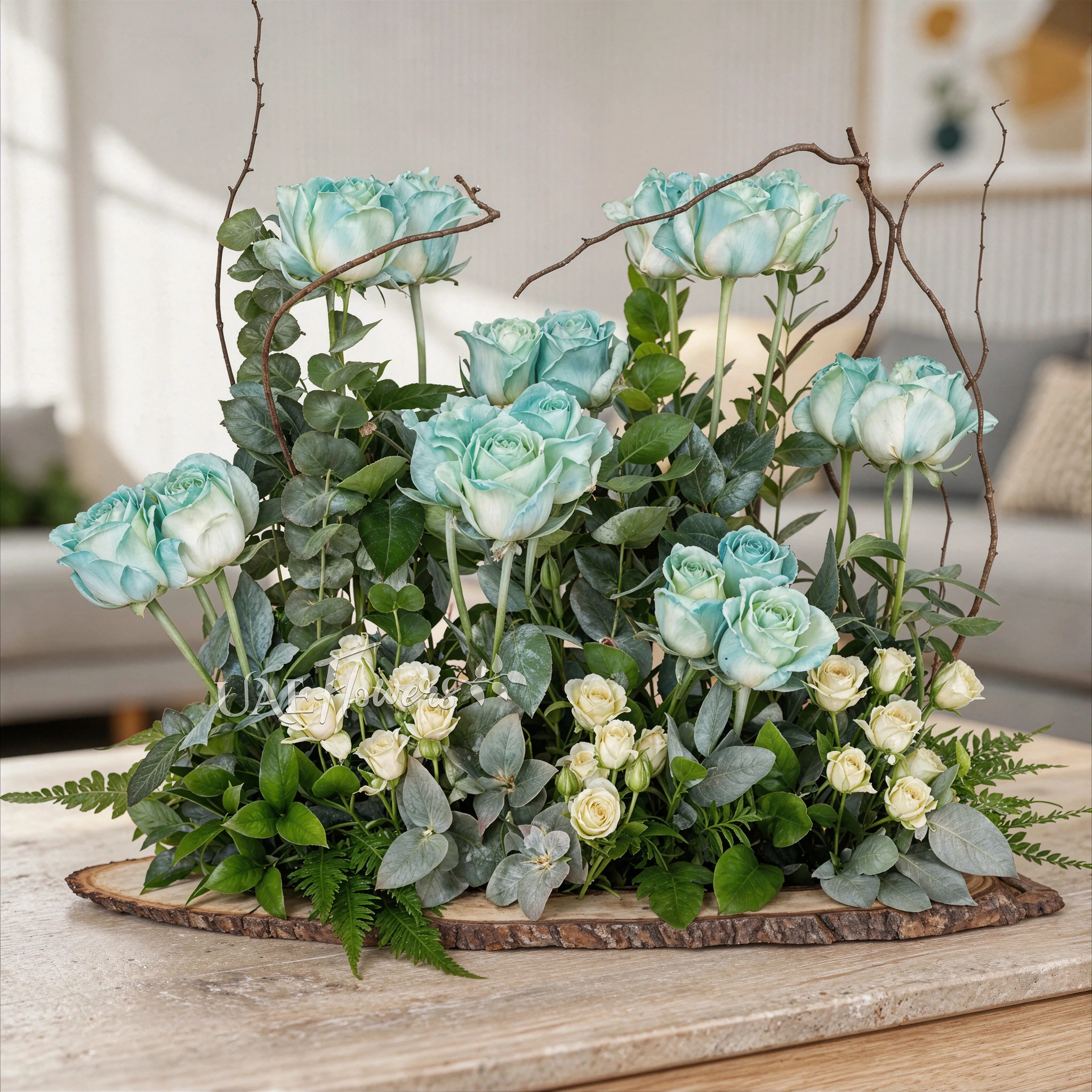 20 blue-sprayed roses and 3 white spray roses with lush greens