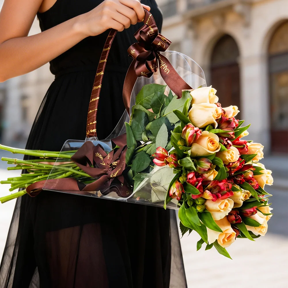 peach roses and 3 red alstroemeria.